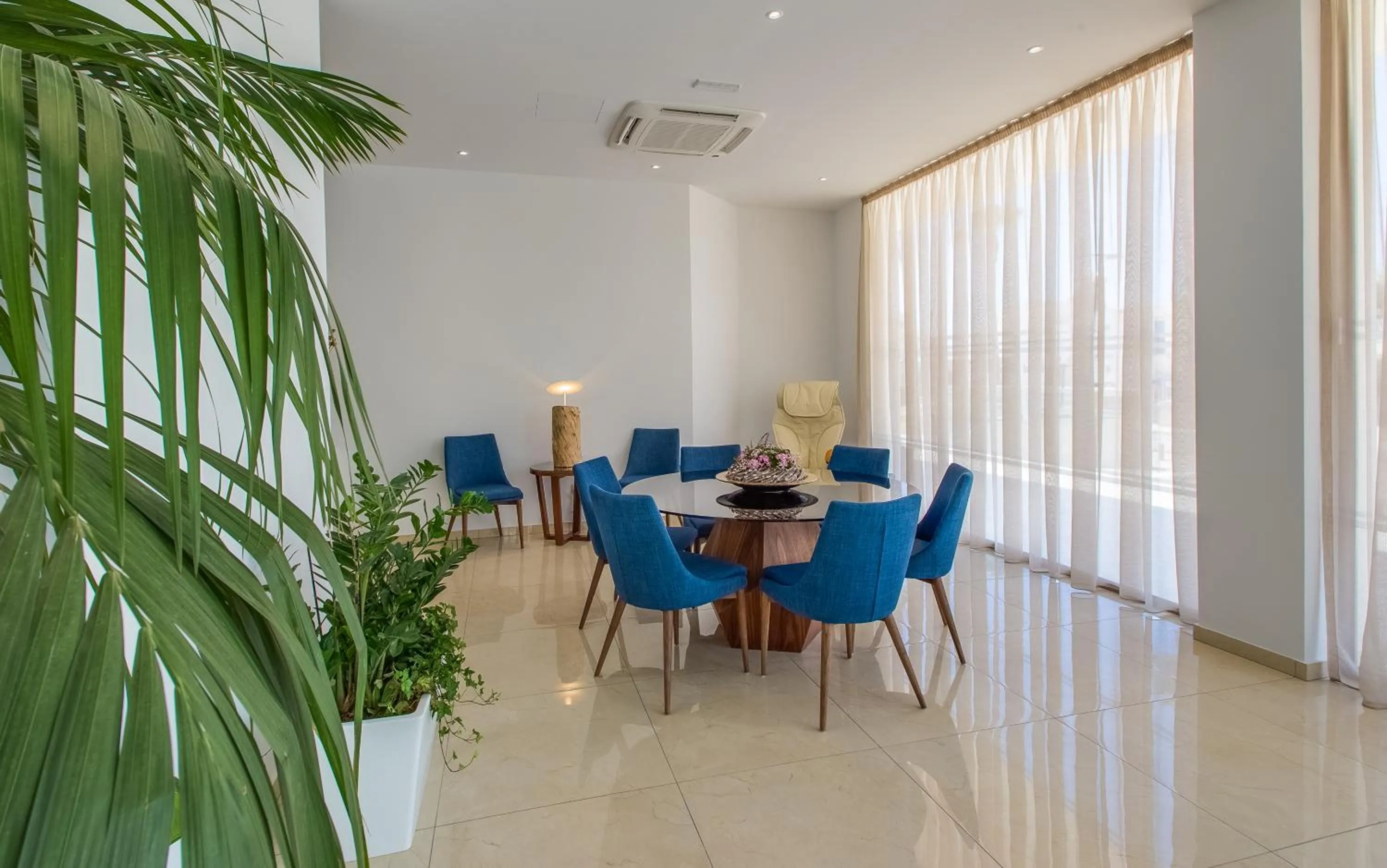 Communal lounge/ TV room in Stamatia Hotel