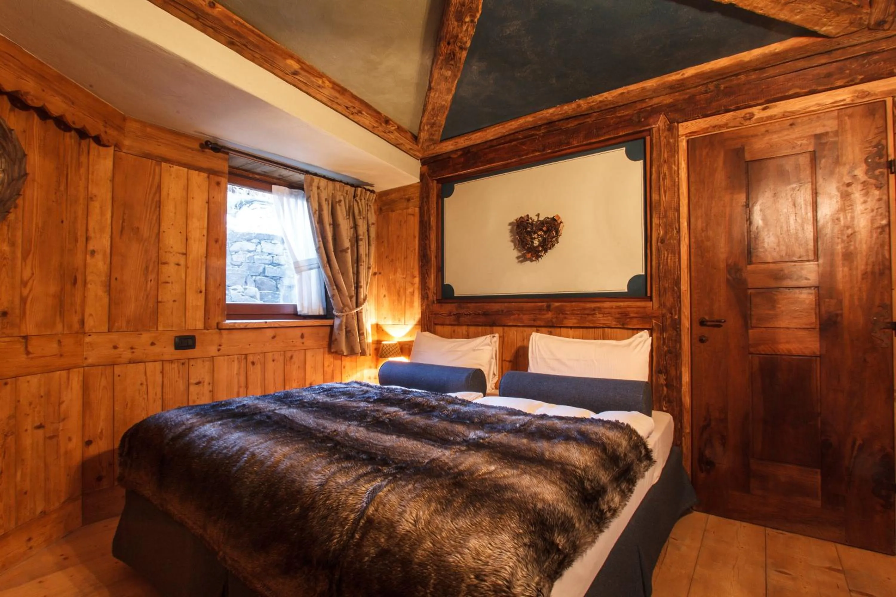 Bed in Au Coeur Des Neiges Resort SPA & FREE E-BIKE
