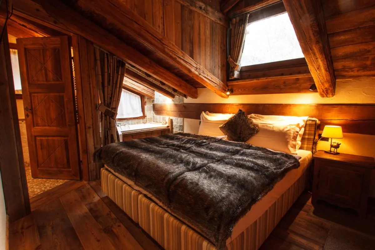 Bed in Au Coeur Des Neiges Resort SPA & FREE E-BIKE