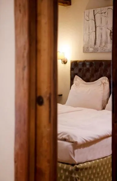 Bed in Au Coeur Des Neiges Resort SPA & FREE E-BIKE
