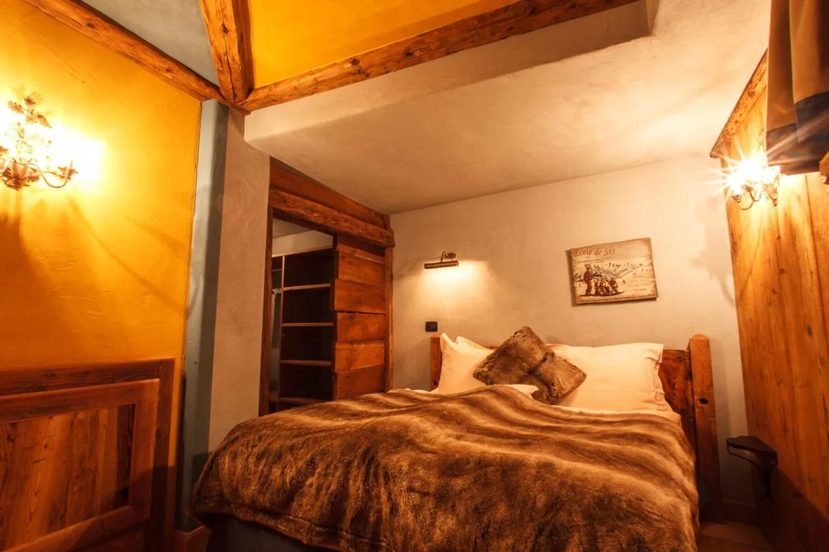 Bed in Au Coeur Des Neiges Resort SPA & FREE E-BIKE