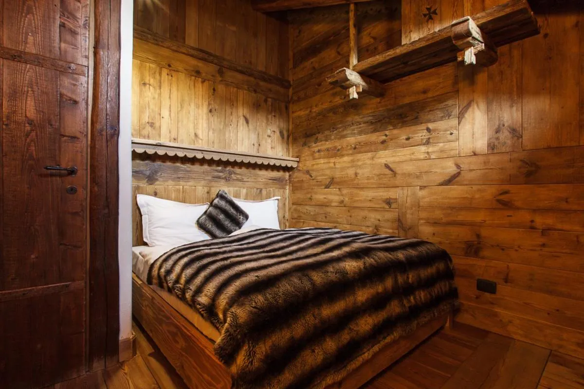 Bed in Au Coeur Des Neiges Resort SPA & FREE E-BIKE