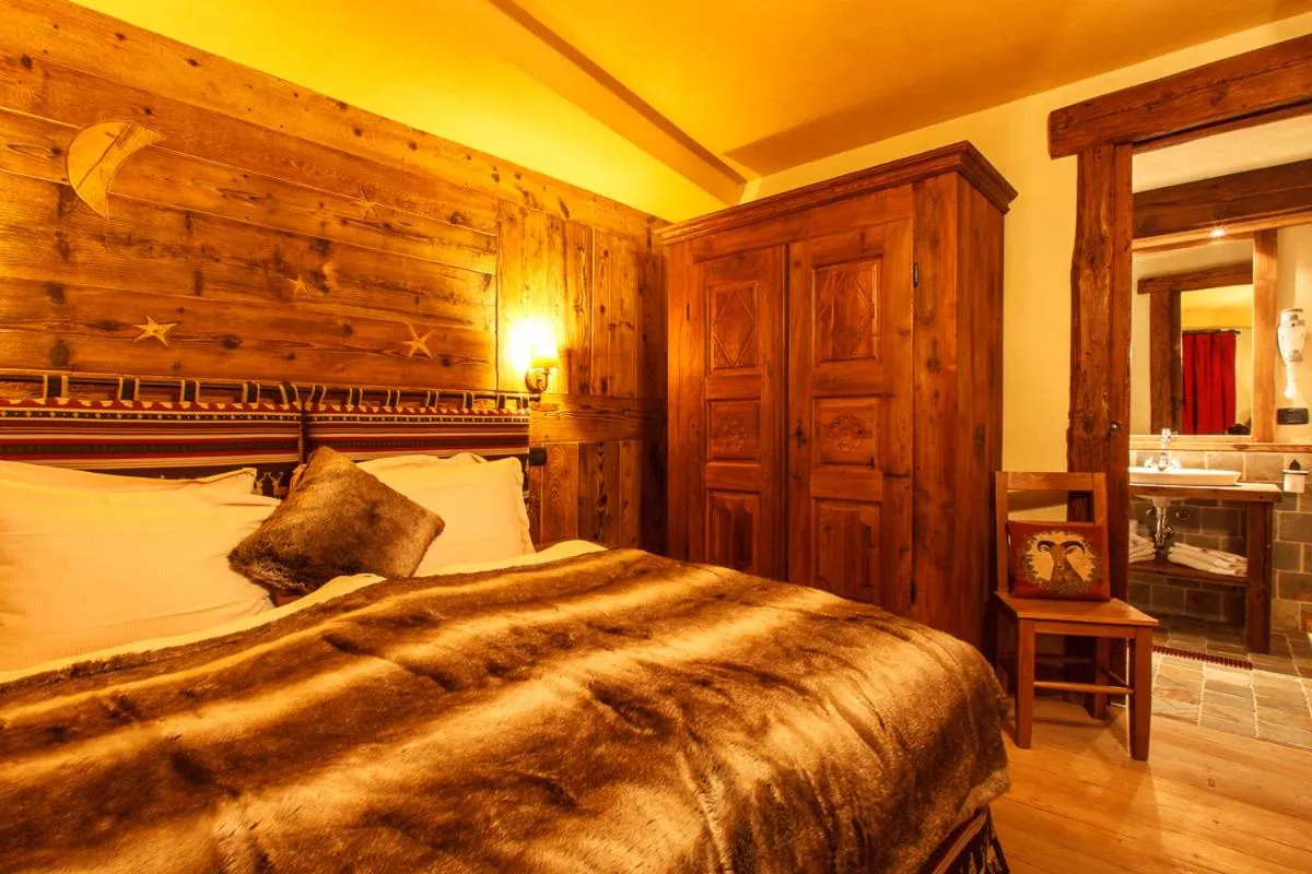Bed in Au Coeur Des Neiges Resort SPA & FREE E-BIKE