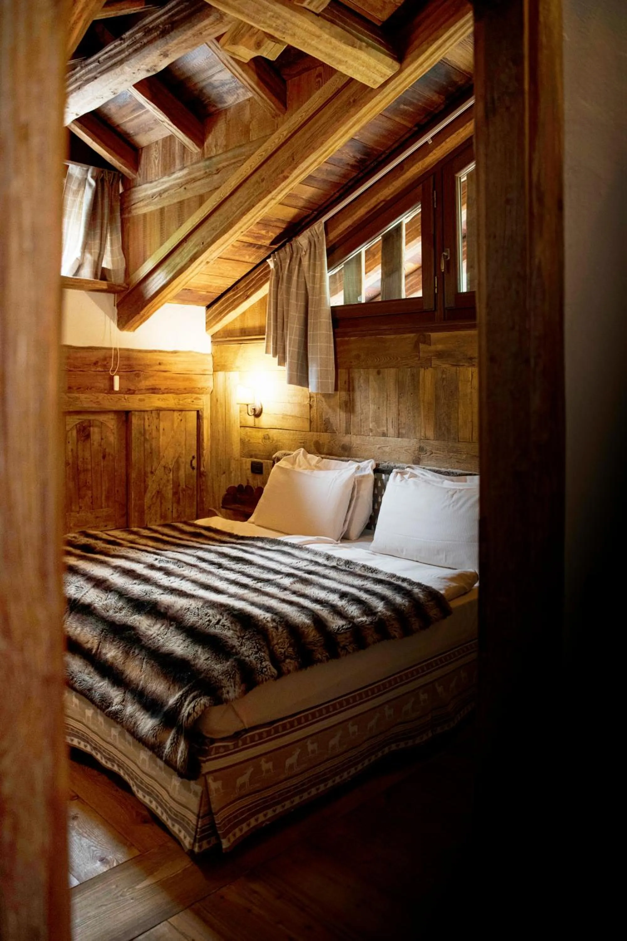 Bed in Au Coeur Des Neiges Resort SPA & FREE E-BIKE