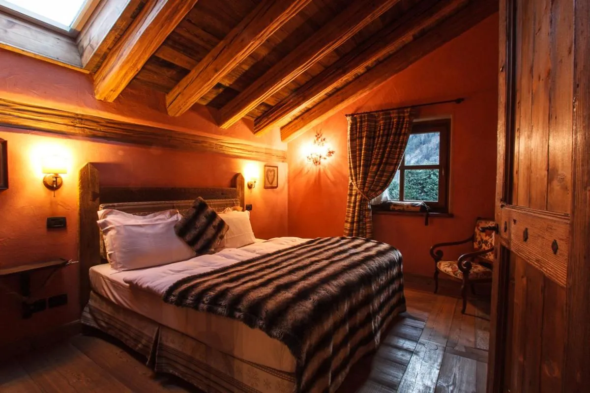 Bed in Au Coeur Des Neiges Resort SPA & FREE E-BIKE