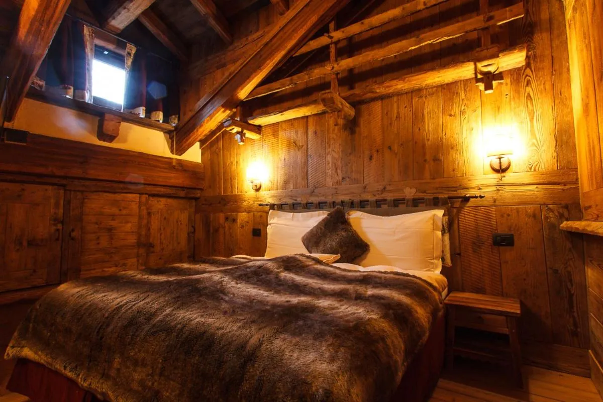 Bed in Au Coeur Des Neiges Resort SPA & FREE E-BIKE