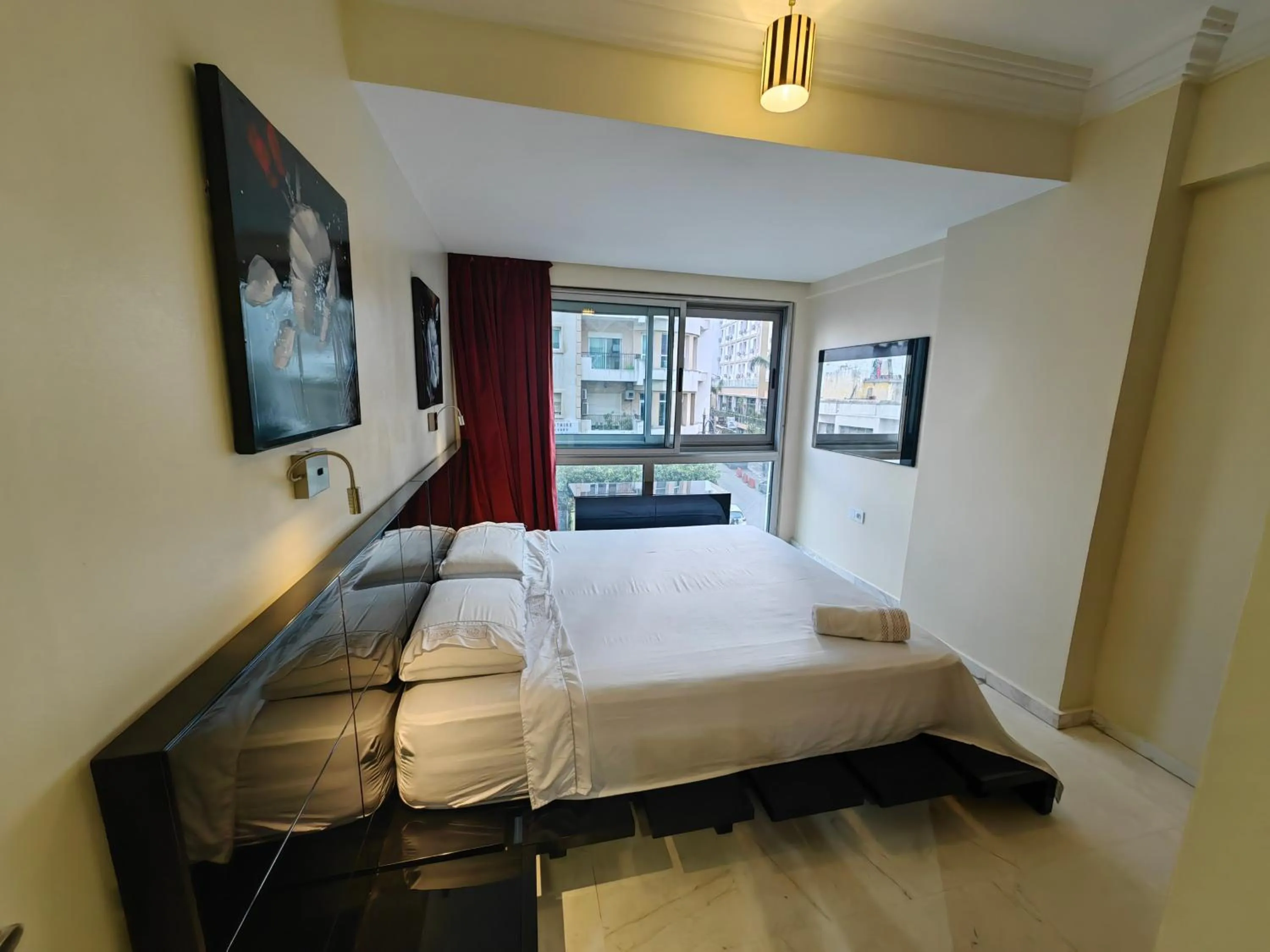 Communal lounge/ TV room, Bed in City Bleu Maroc