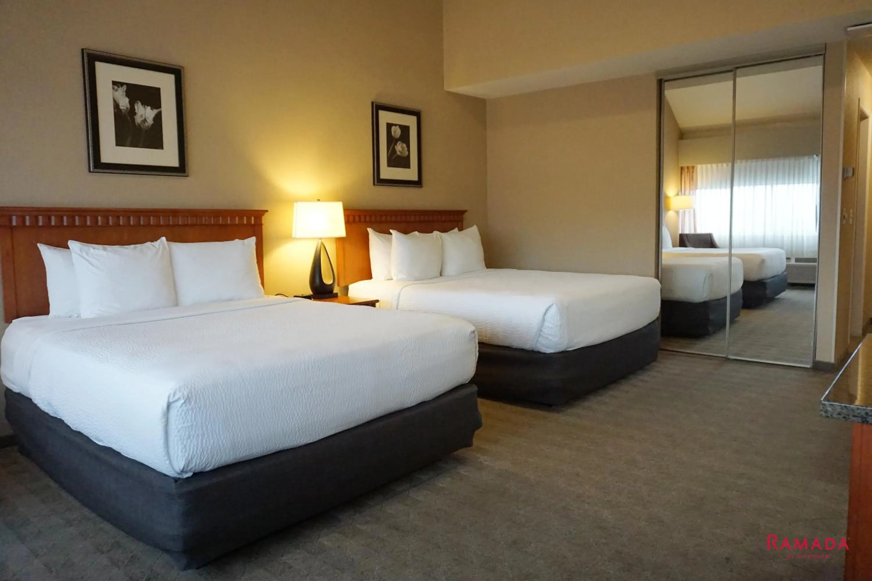 Bed in Ramada by Wyndham Kelowna Hotel & Conference Center