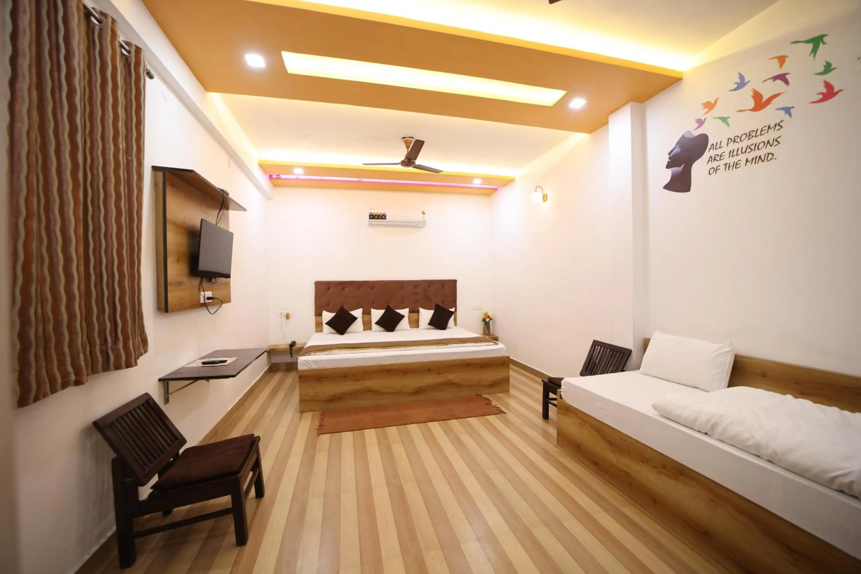 Bed in Hotel Taj Niwas