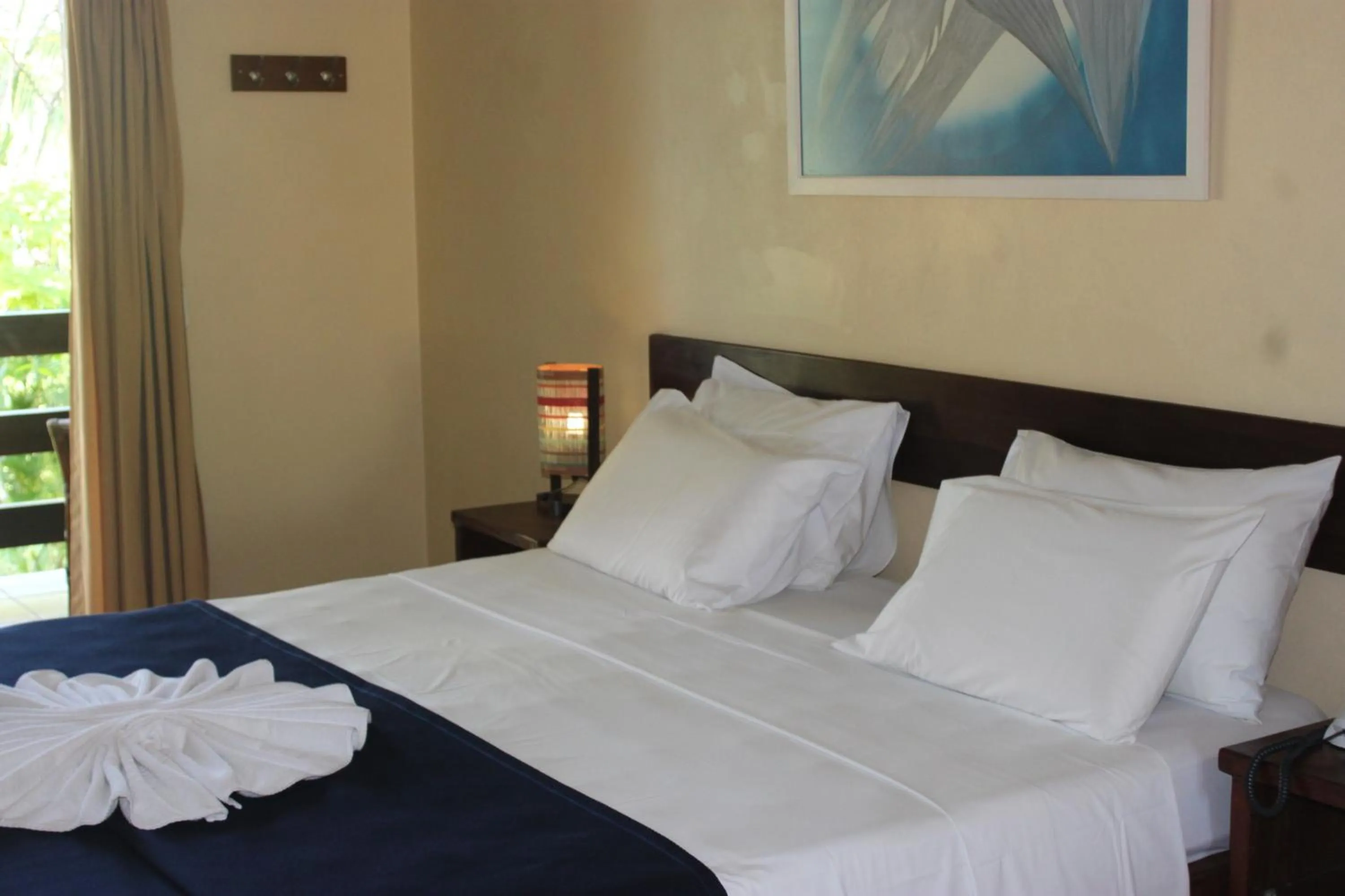 Bed in Porto Zarpa Hotel