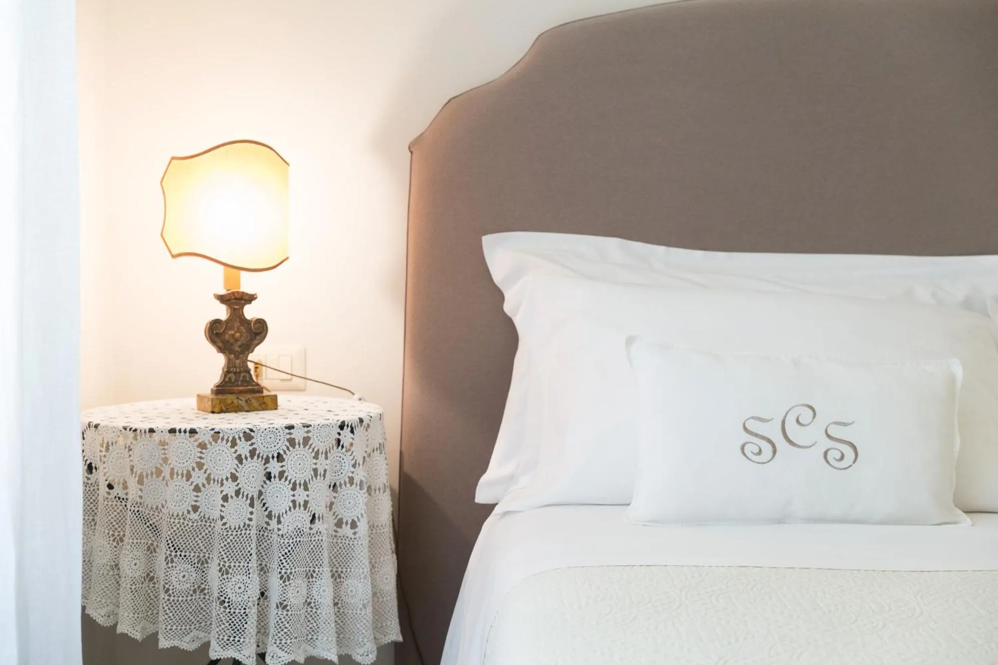 Bed in San Carlo Suites