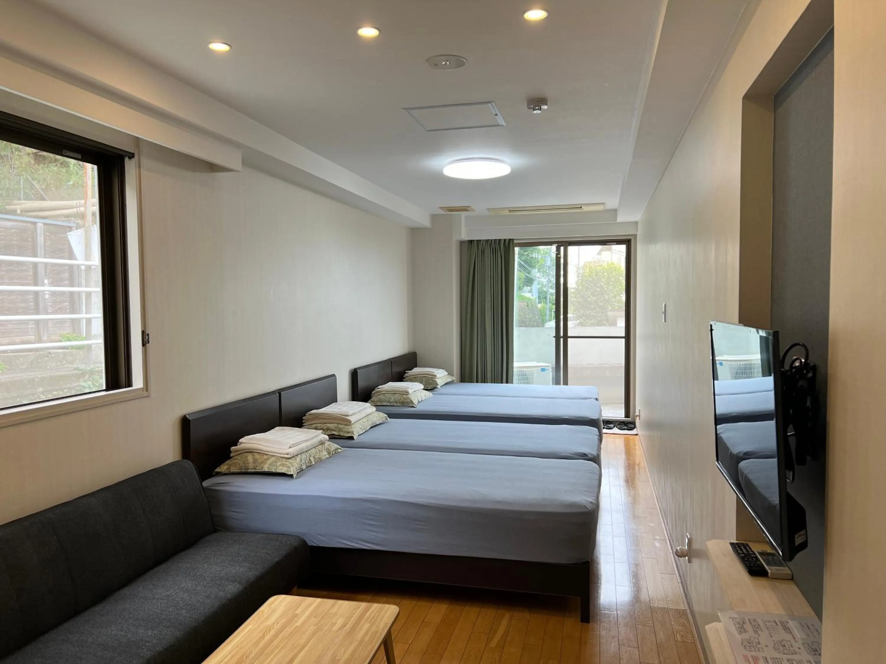 Bed in Atami Onsen Guest House Megumi 5 minutes walk from Atami Station