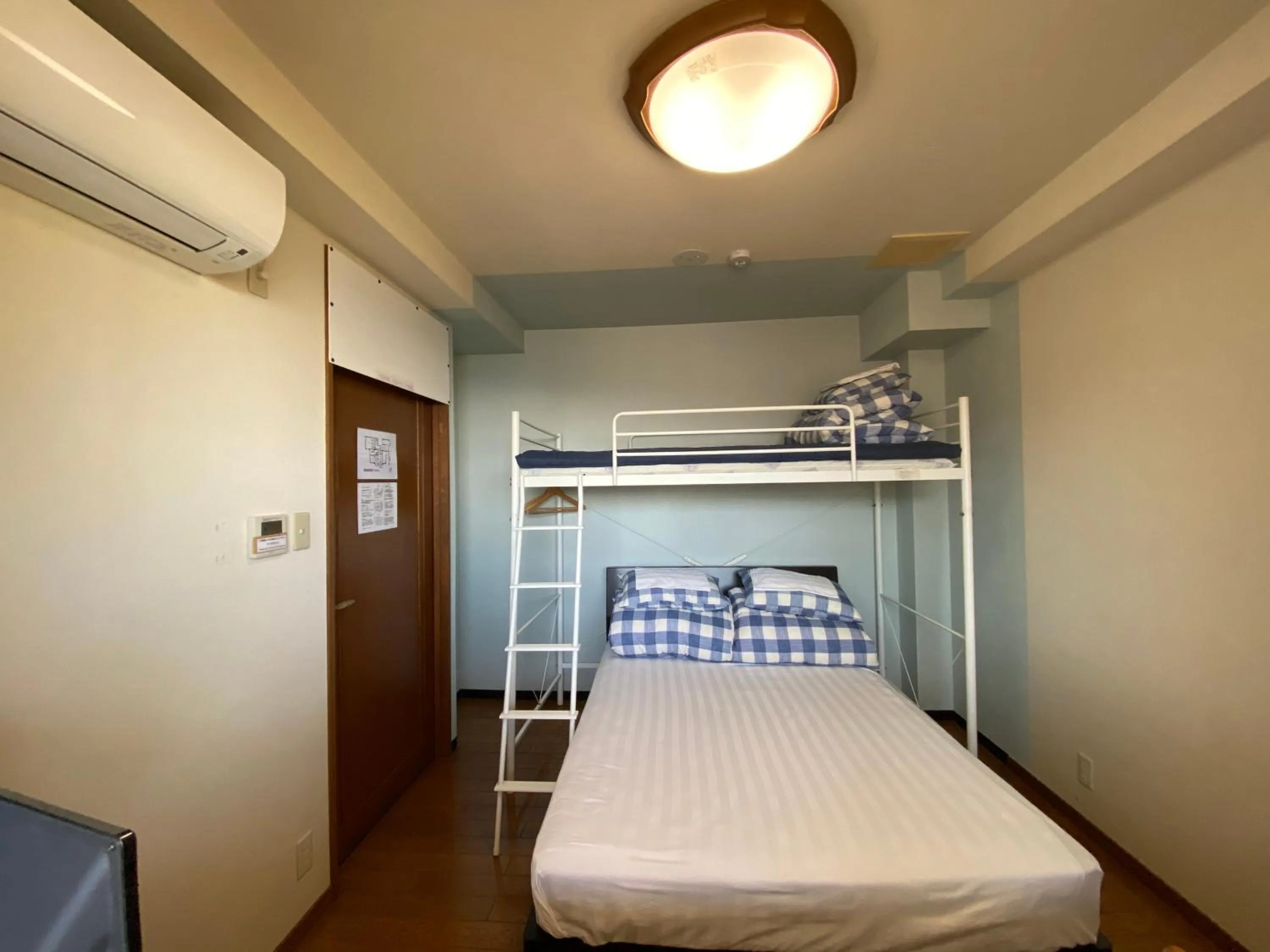 Bed in Atami Onsen Guest House Megumi 5 minutes walk from Atami Station