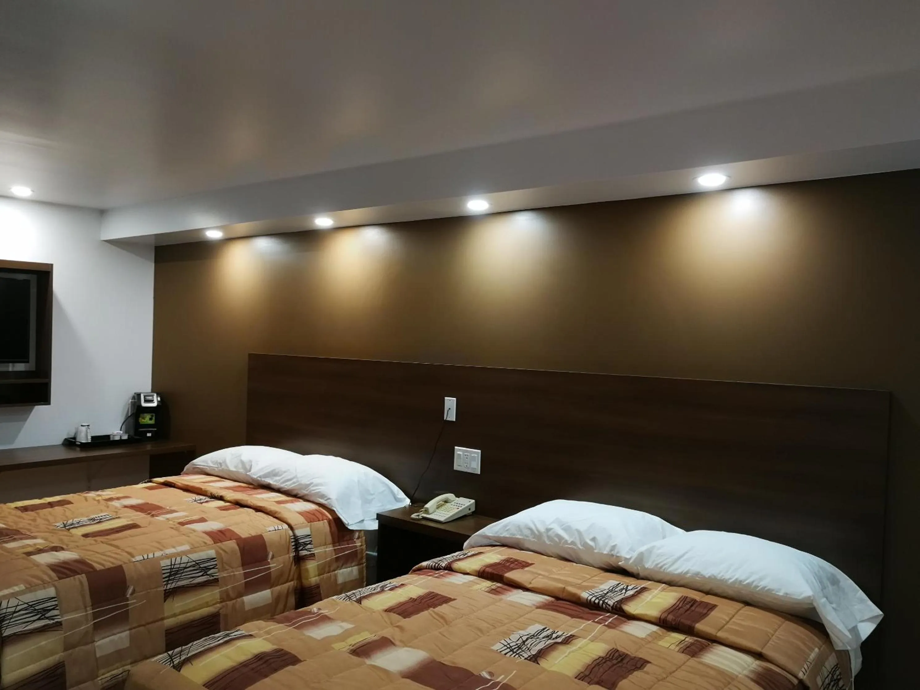 Bed in Motel Chez Nous