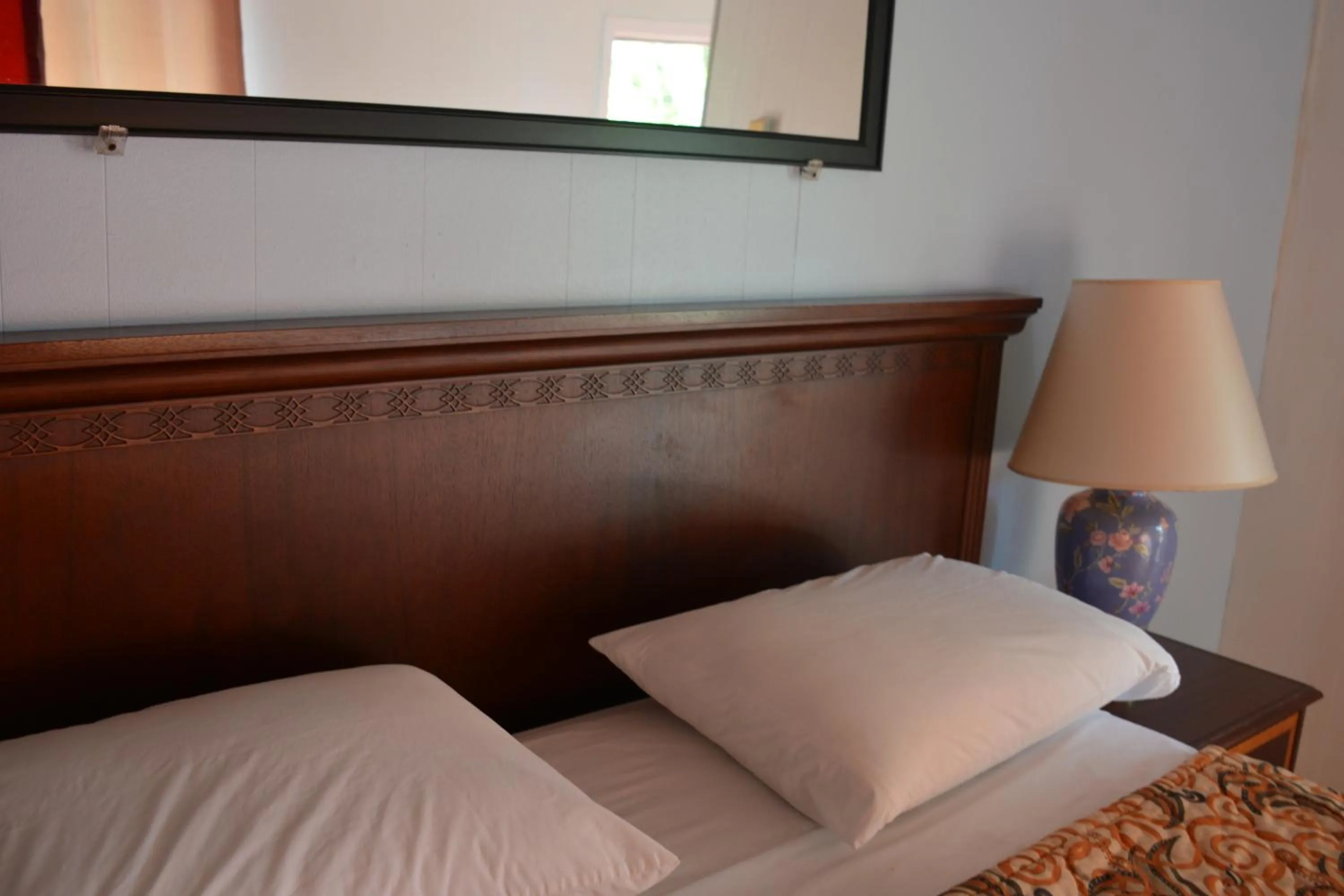 Bed in Motel Chez Nous