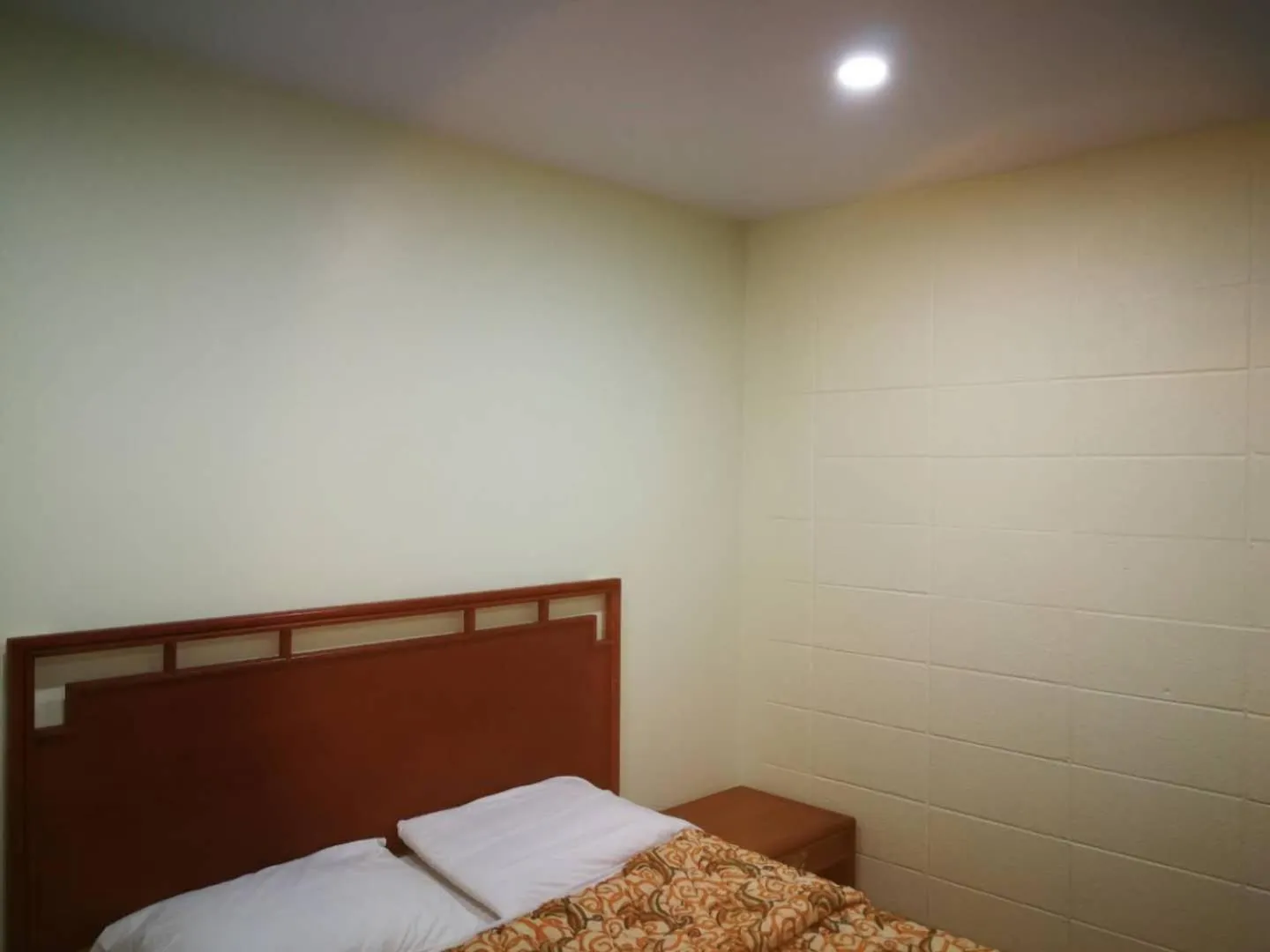 Bed in Motel Chez Nous