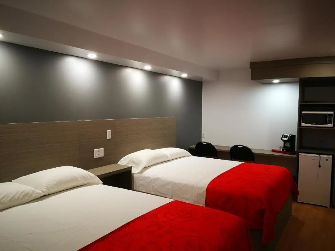 Bed in Motel Chez Nous