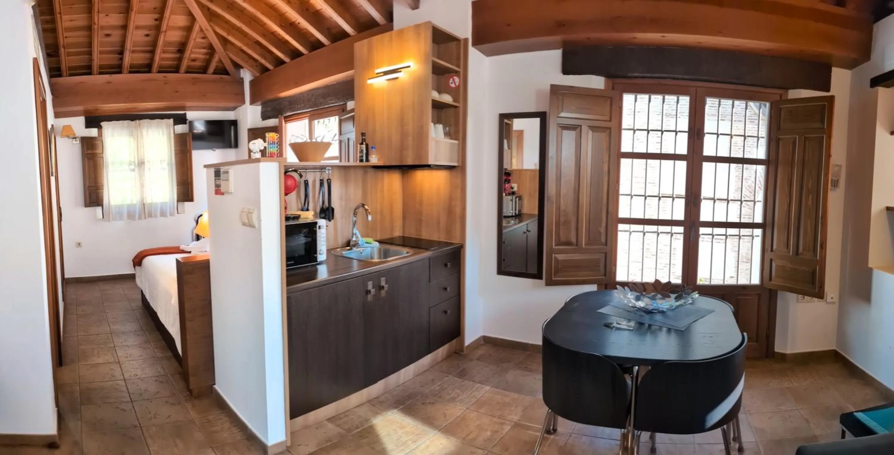 Kitchen or kitchenette in Apartamentos Alhambra