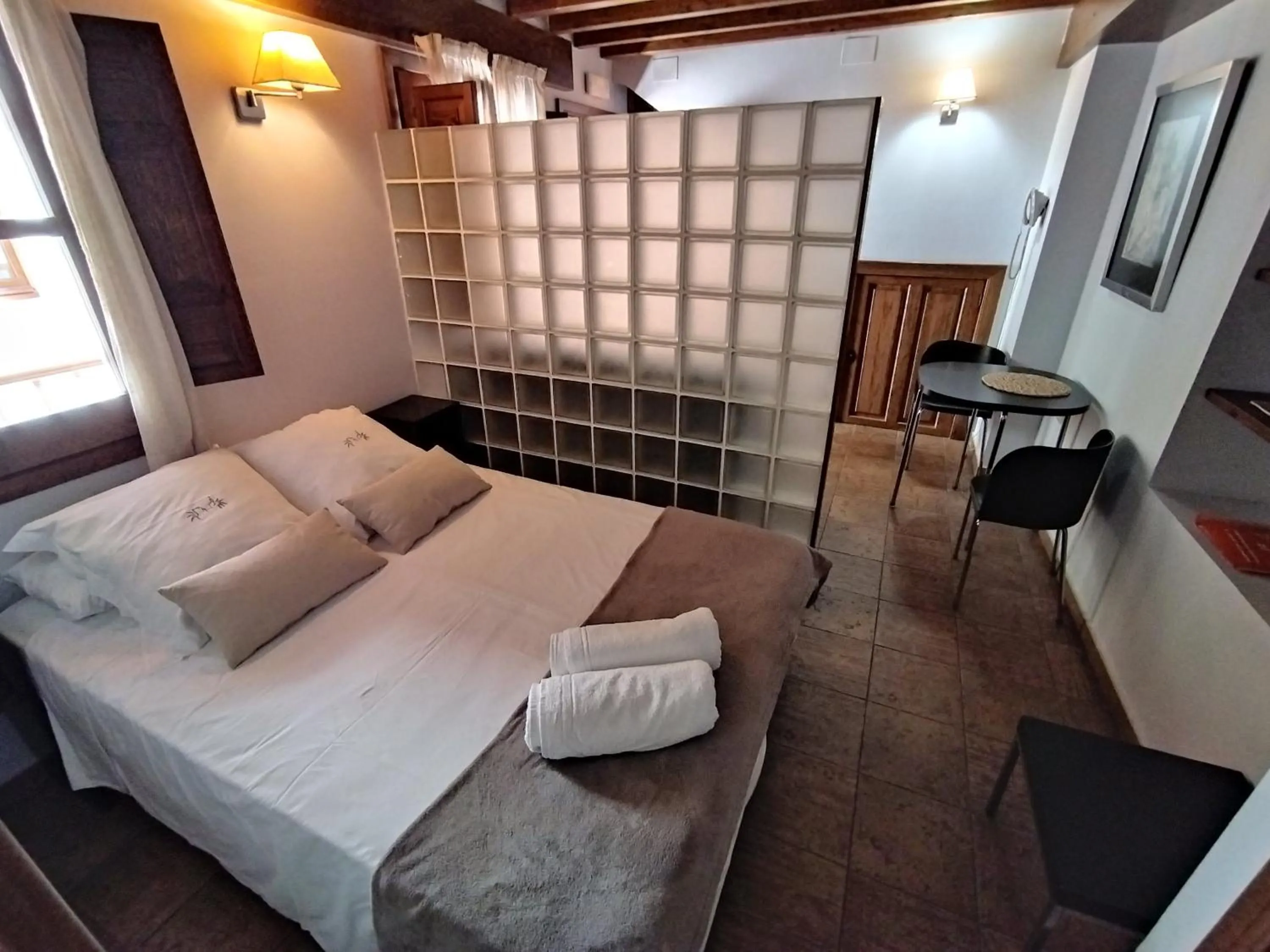 Bed in Apartamentos Alhambra