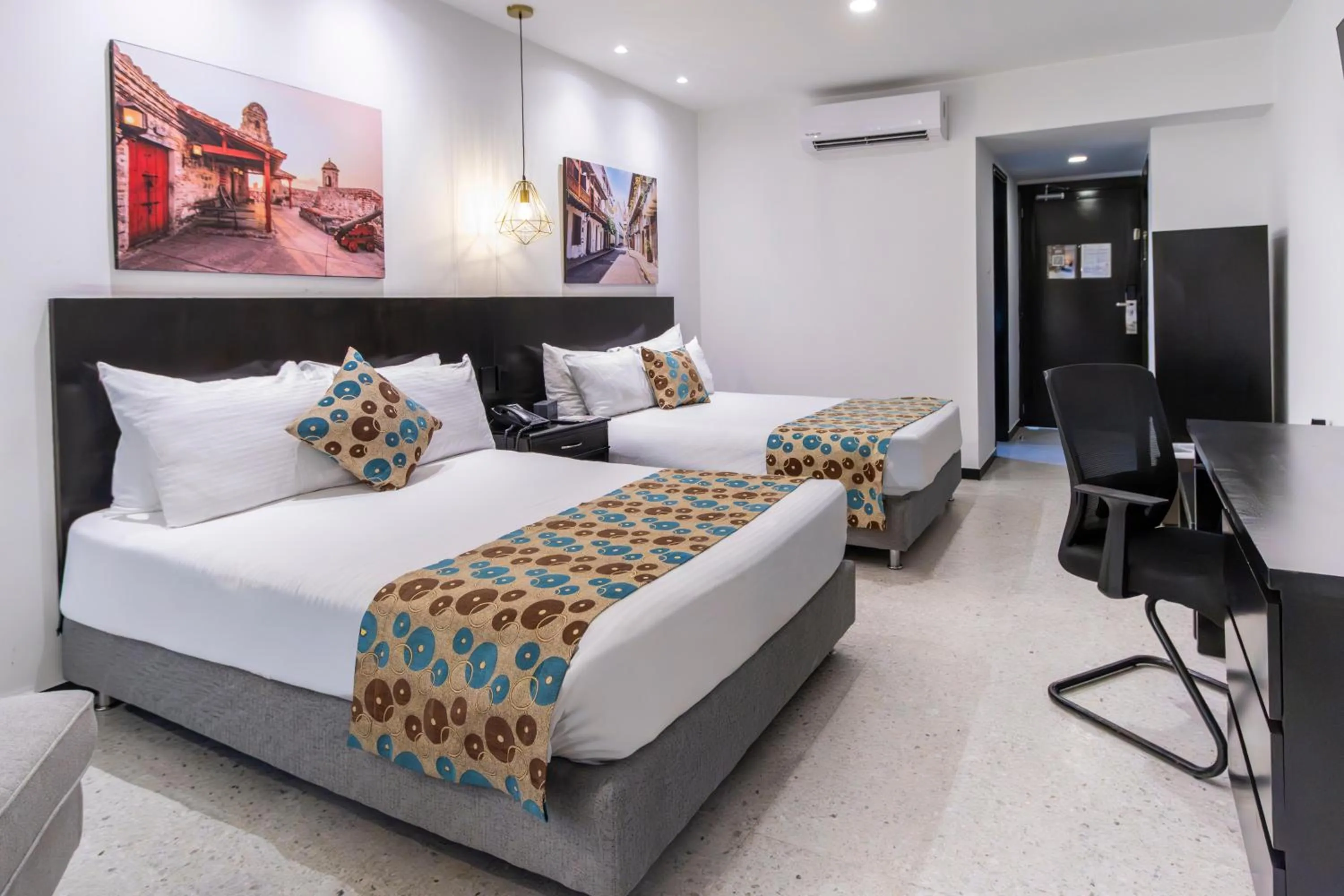 Photo of the whole room, Bed in Hotel Cartagena Plaza