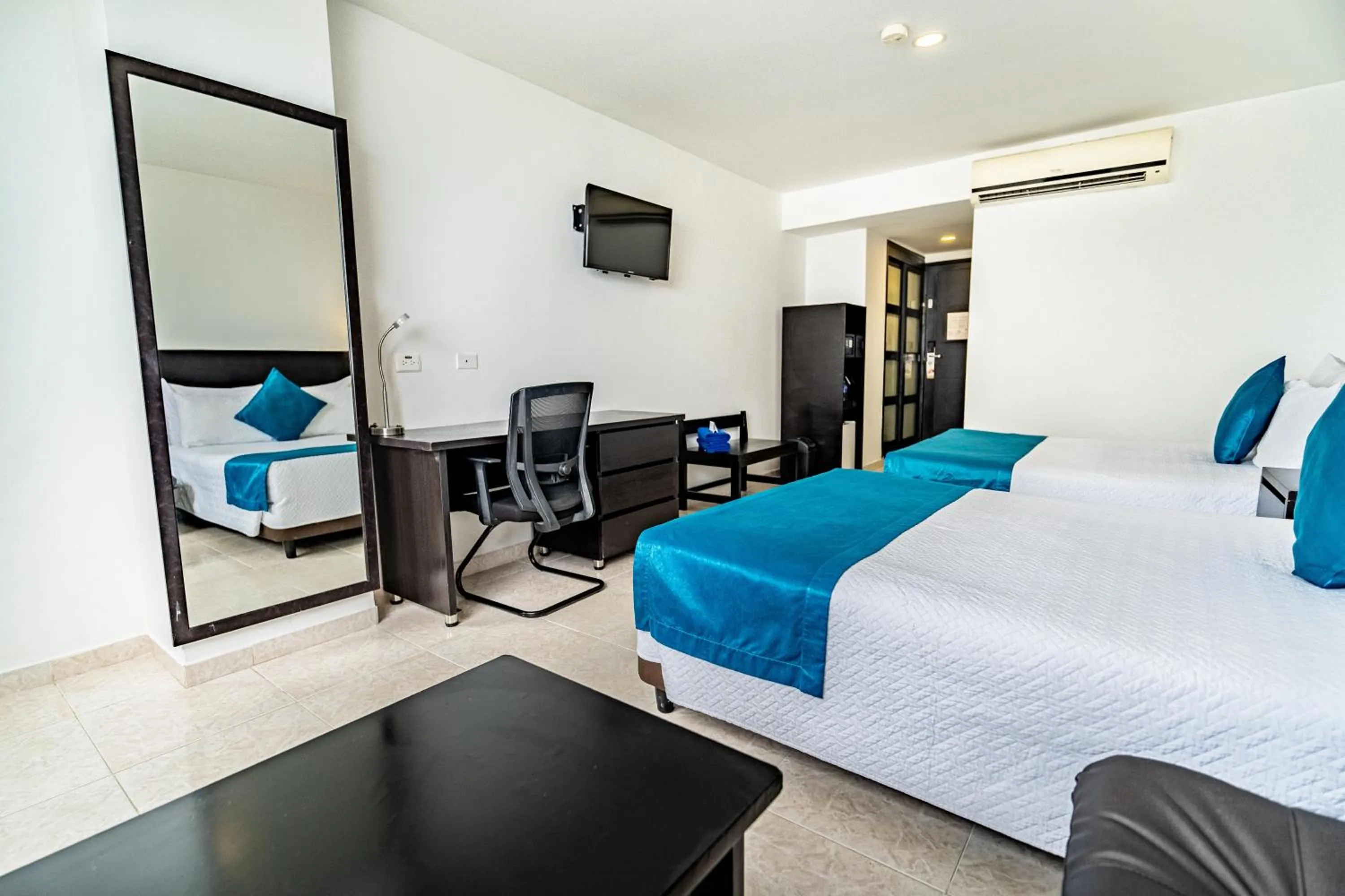 Photo of the whole room, Bed in Hotel Cartagena Plaza