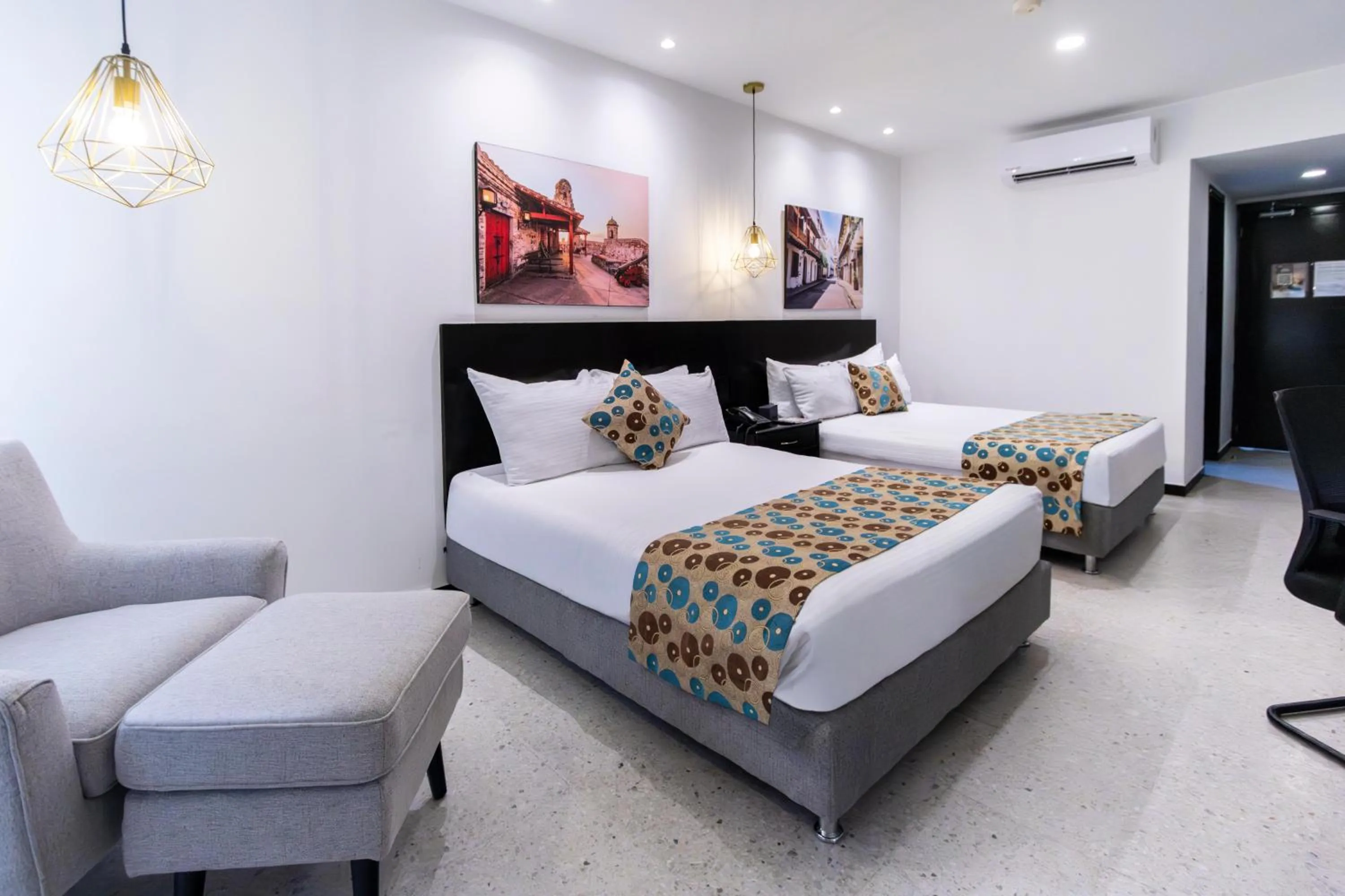 Photo of the whole room, Bed in Hotel Cartagena Plaza