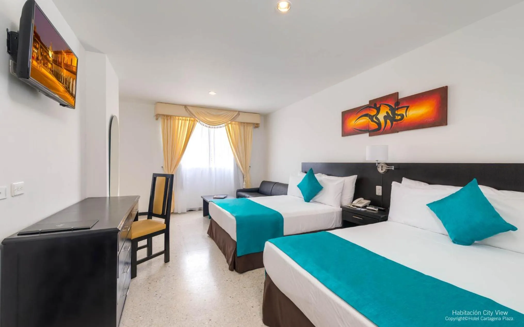 Photo of the whole room, Bed in Hotel Cartagena Plaza