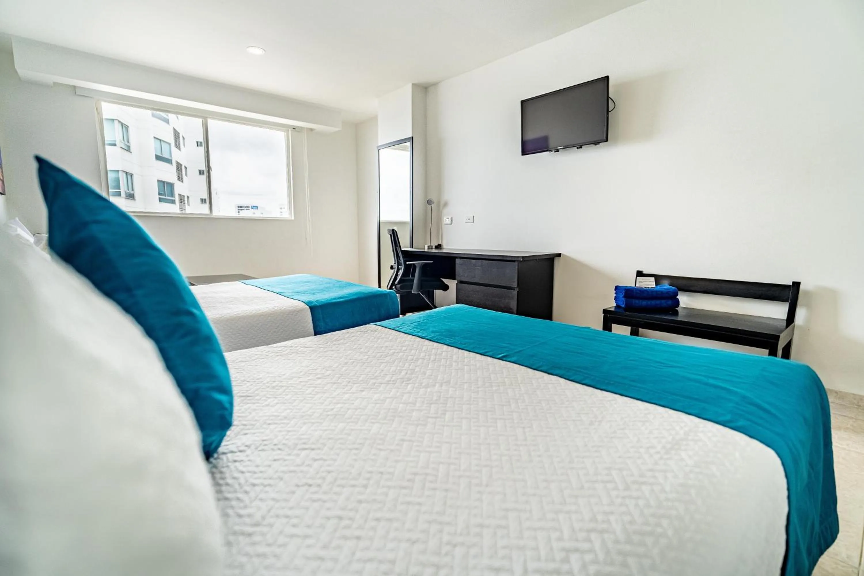 Photo of the whole room, Bed in Hotel Cartagena Plaza