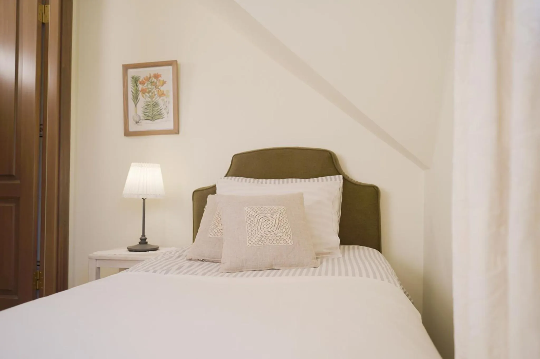 Bed in Karlamuiza Country Hotel