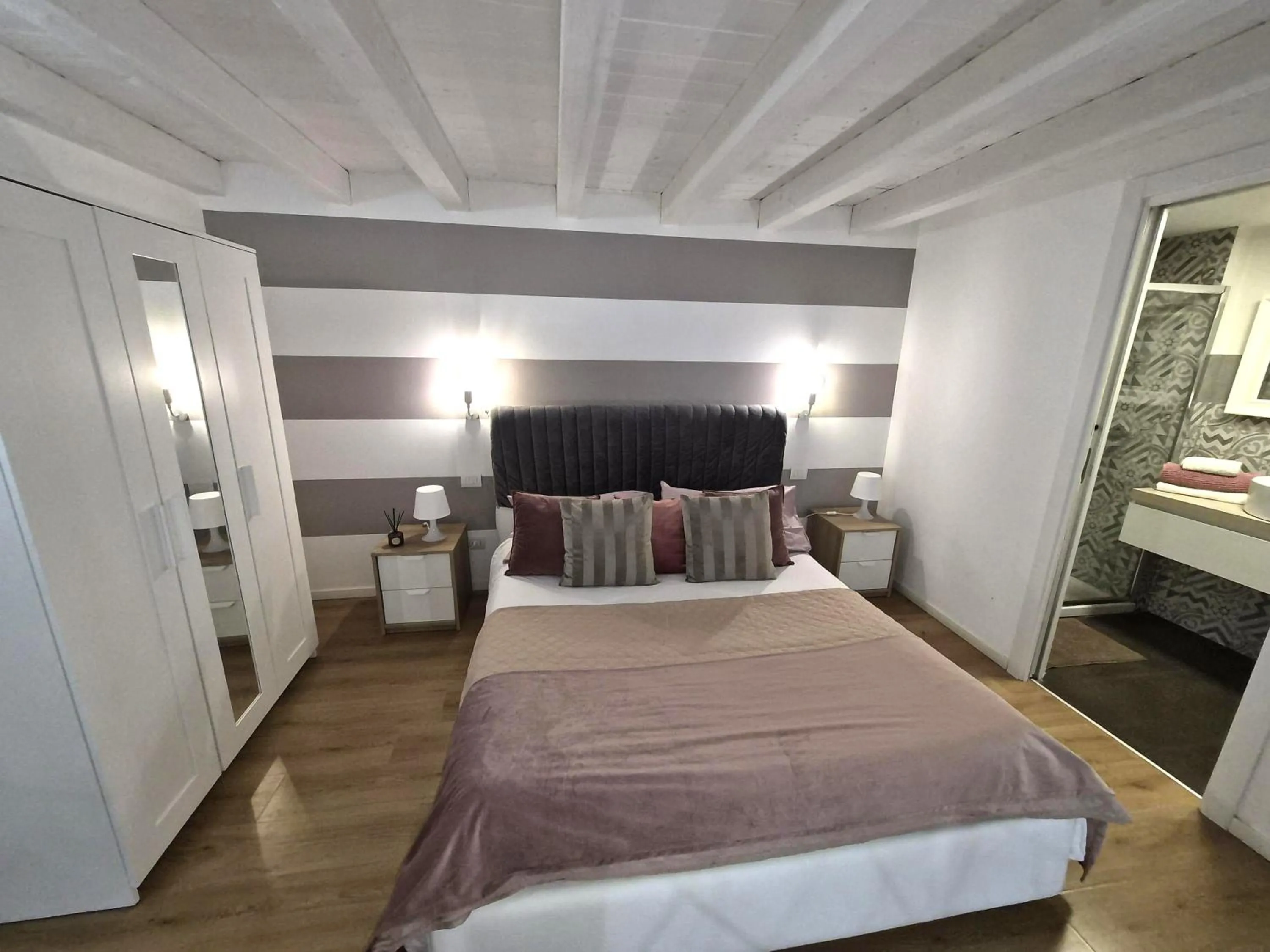 Bed in Conte Durini Apartments & Rooms