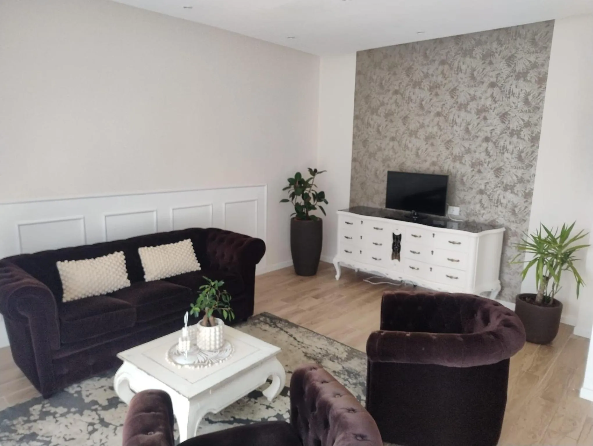 Communal lounge/ TV room in Conte Durini Apartments & Rooms