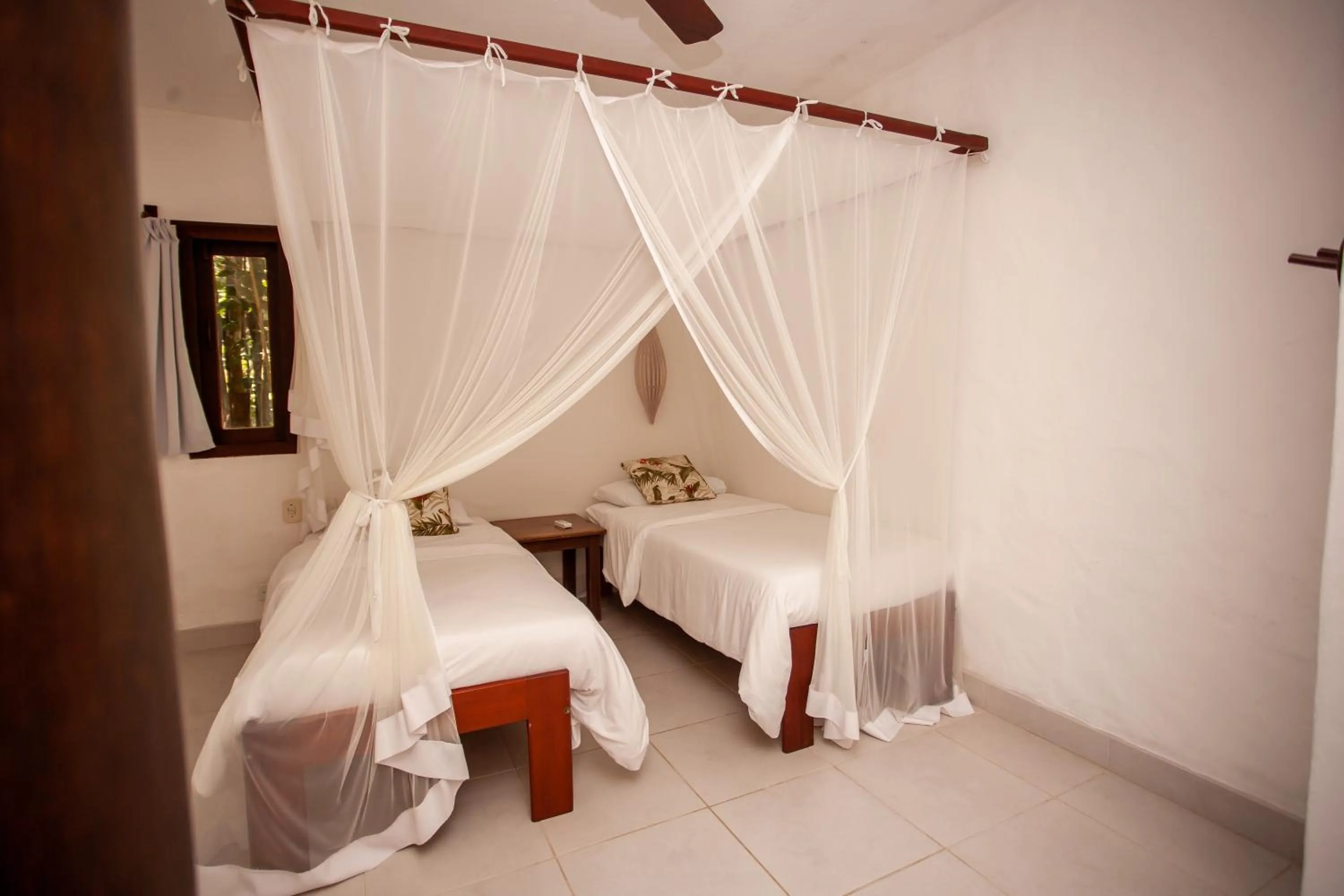 Bed in Pousada Mundo Verde