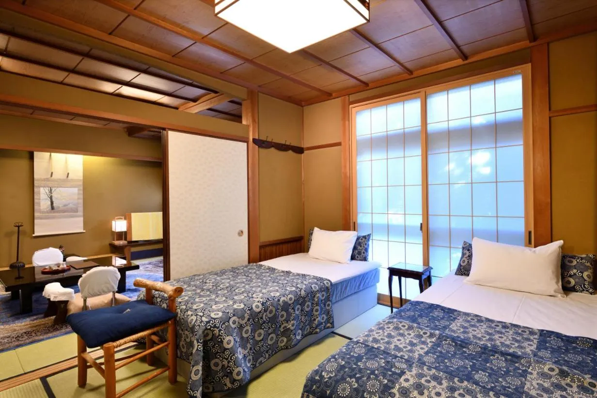 Bed in Seikoro Ryokan - Established in 1831