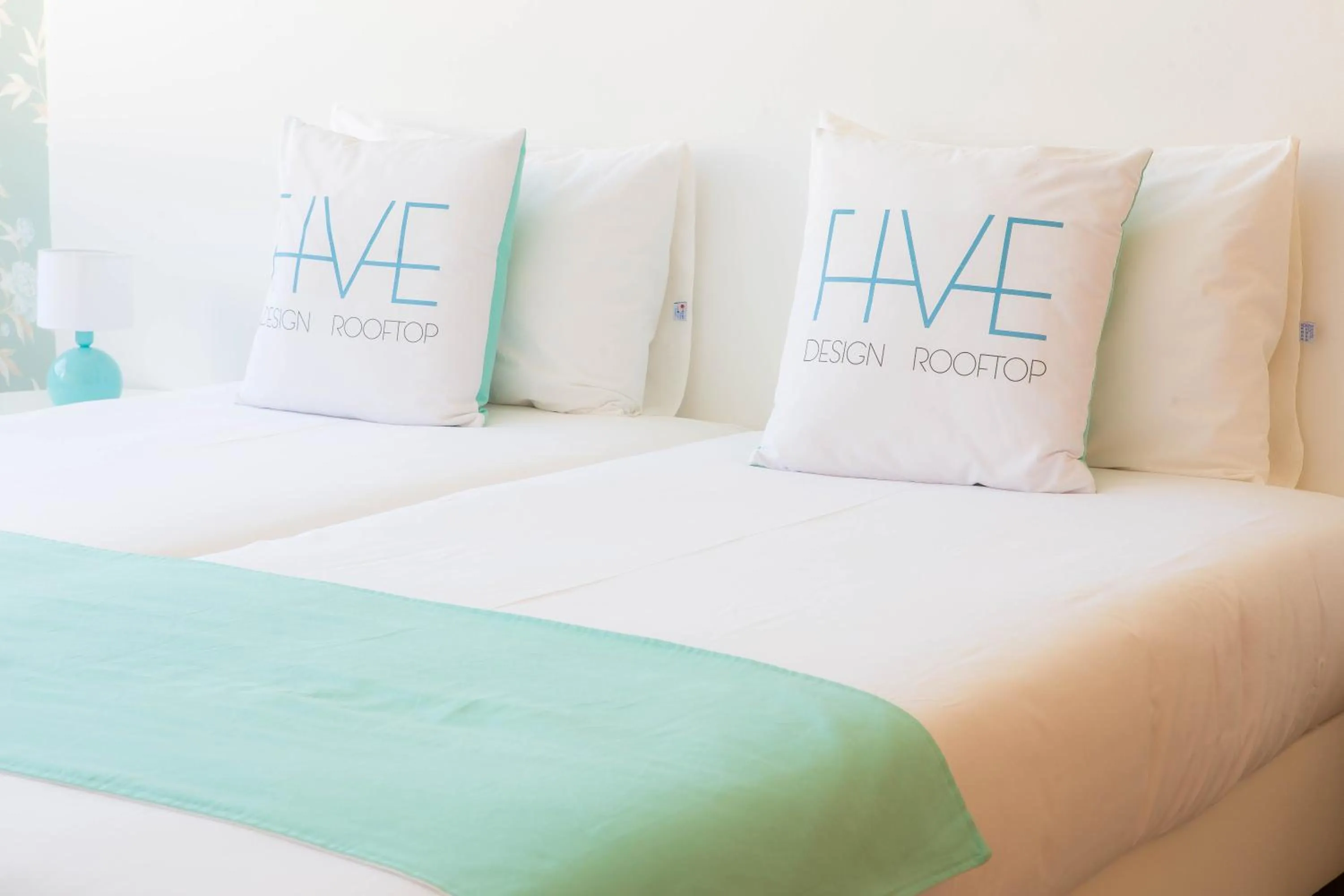 Photo of the whole room, Bed in Five Design Rooftop by Storytellers