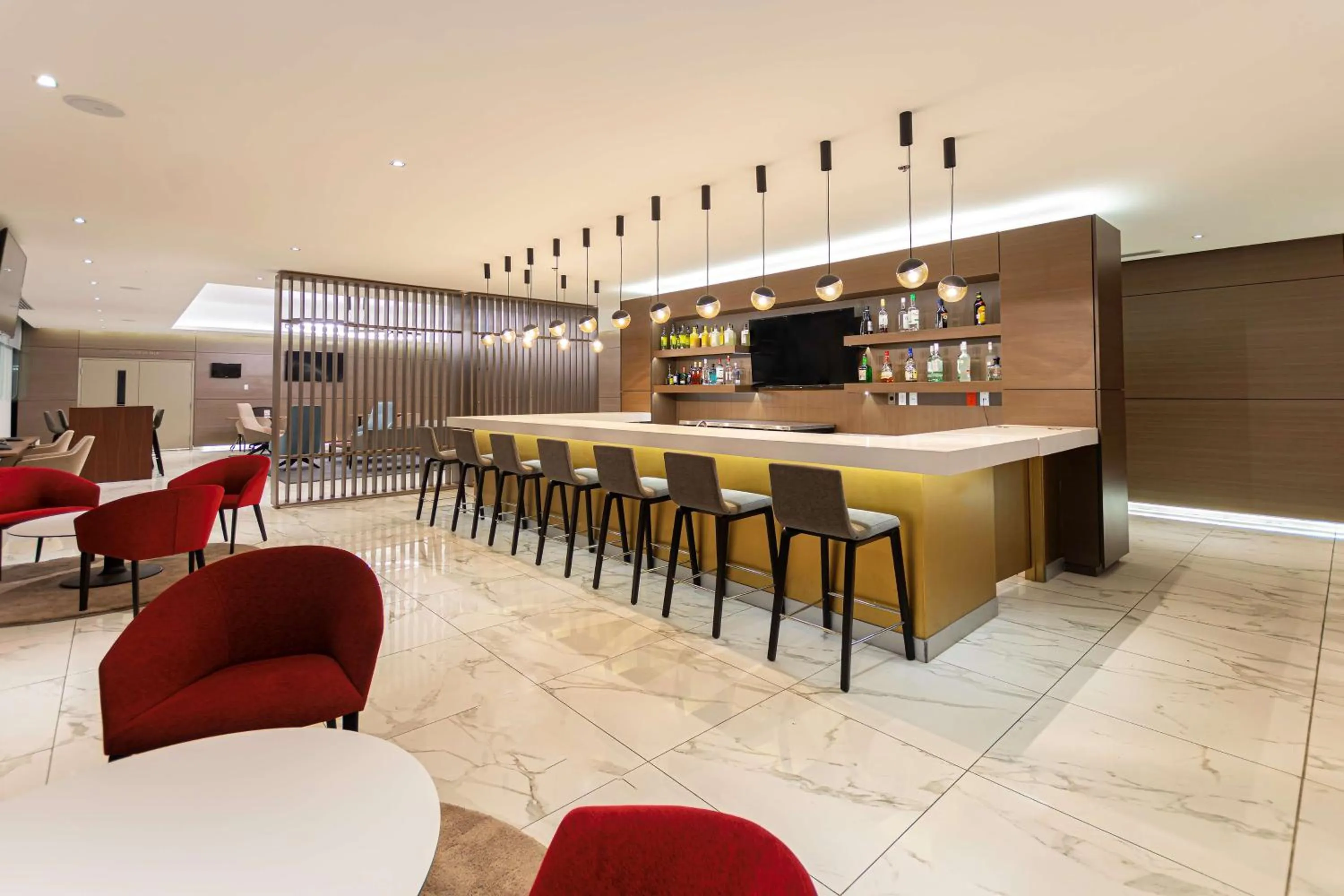 Lounge or bar in NH Monterrey La Fe