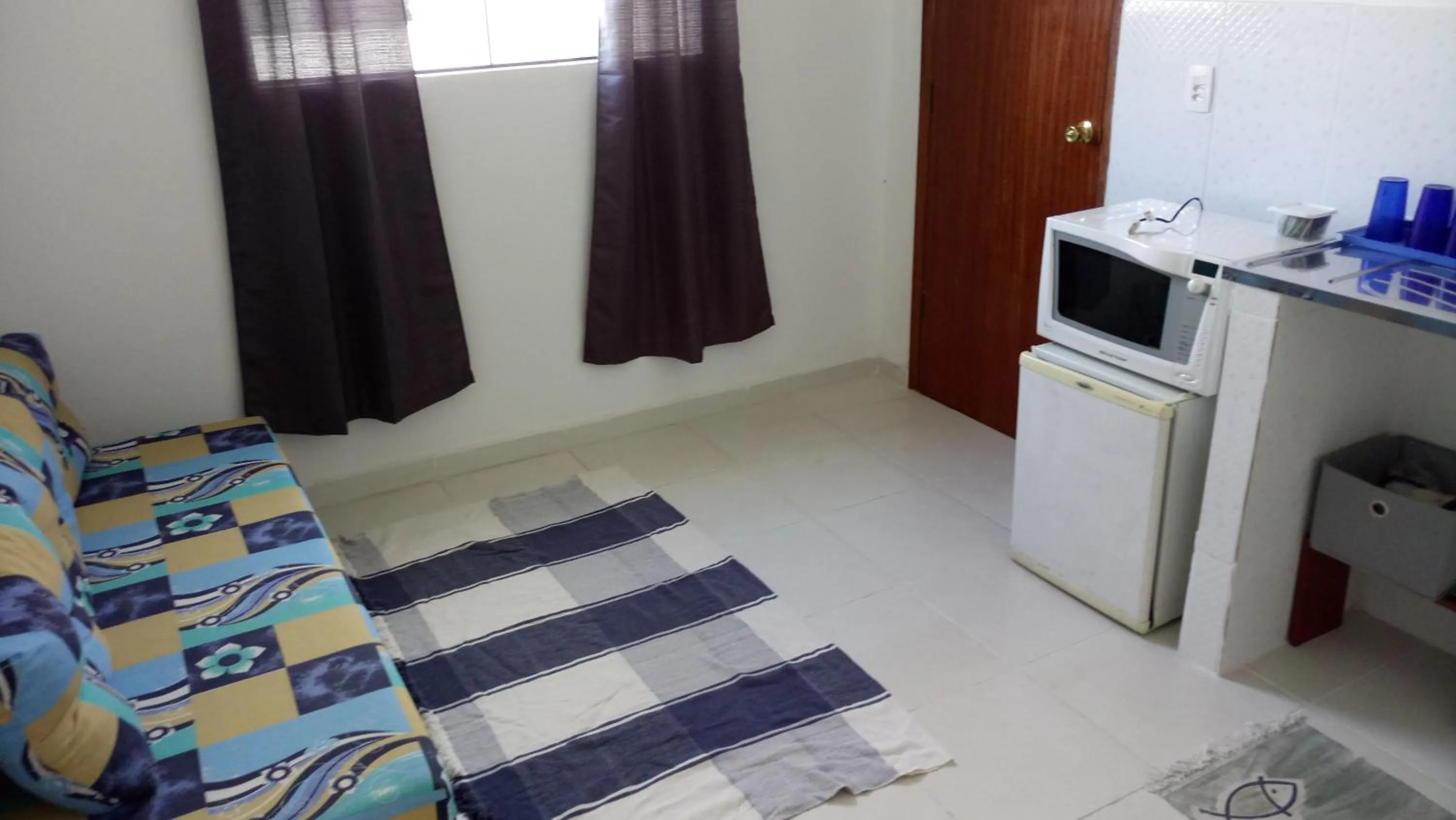 Living room, Bed in Resende Flats GR