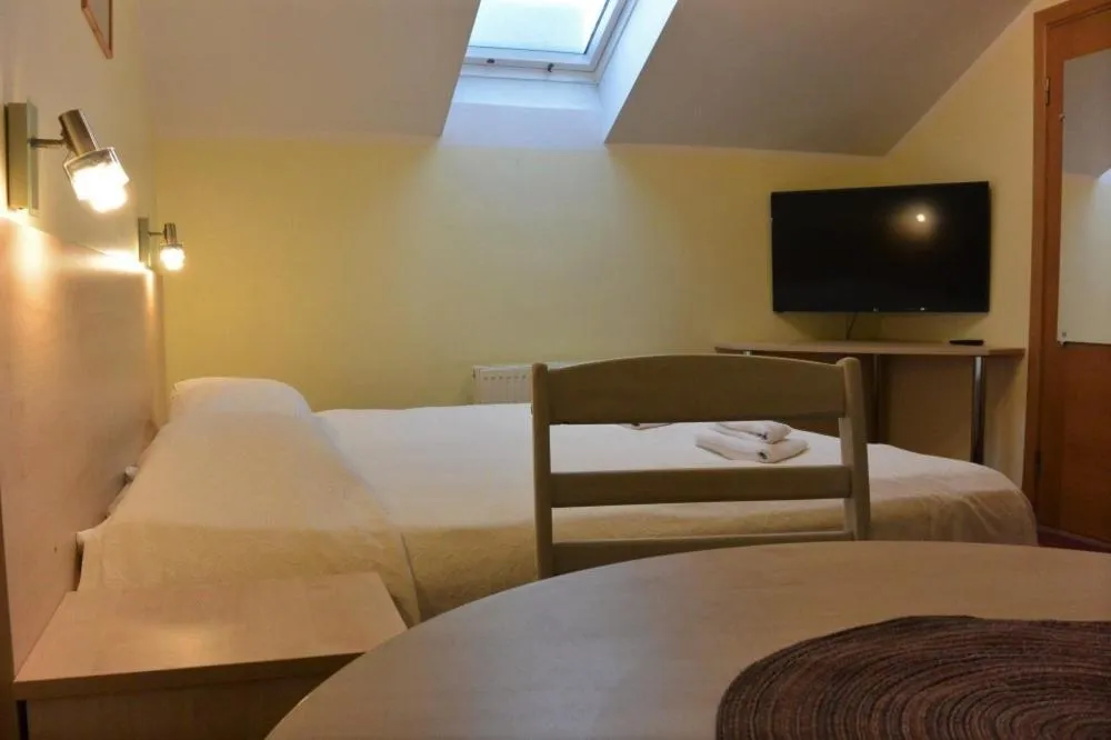 TV and multimedia, Bed in Alba Hotel