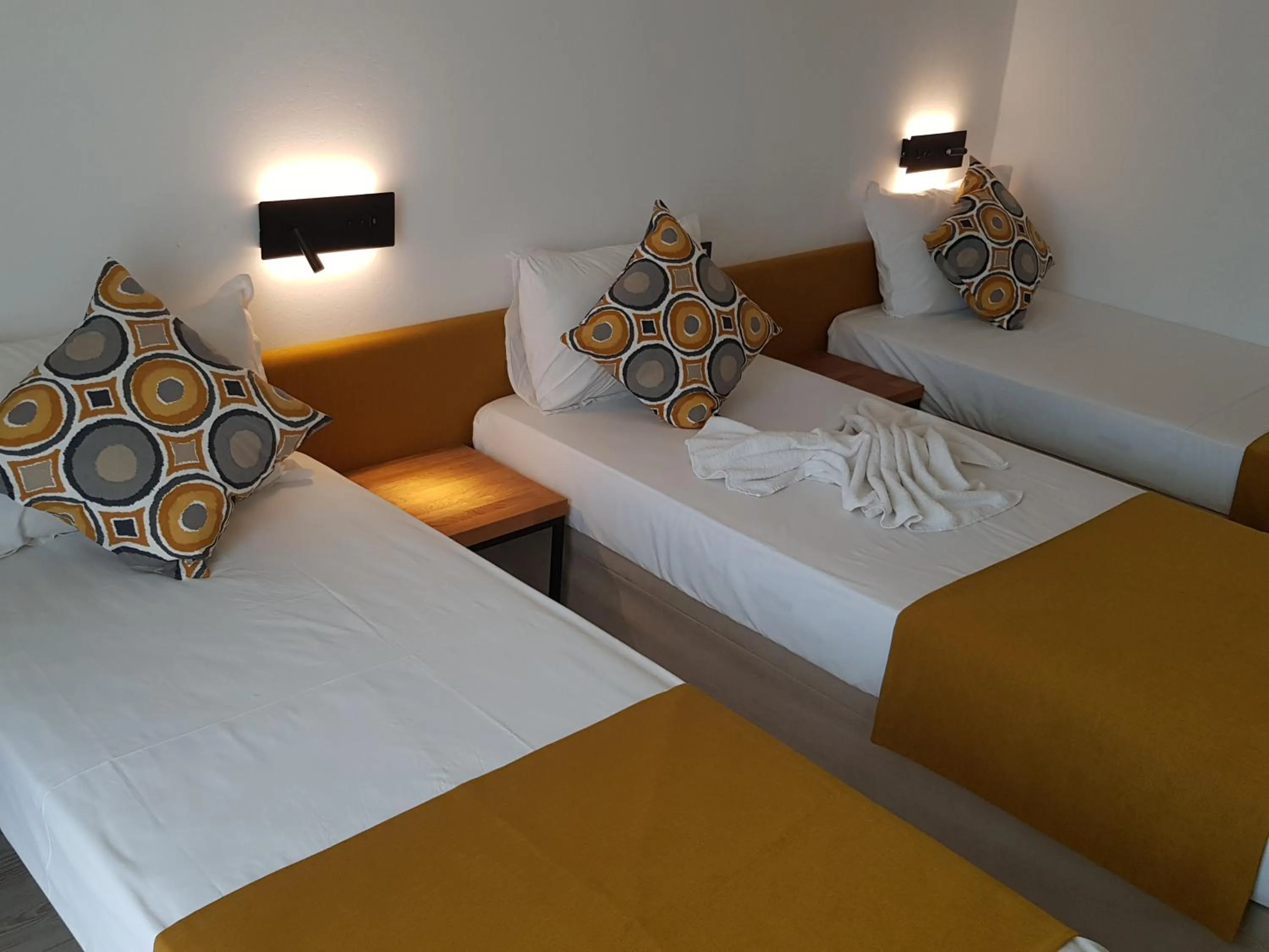 Bed in Tintyava Park Hotel