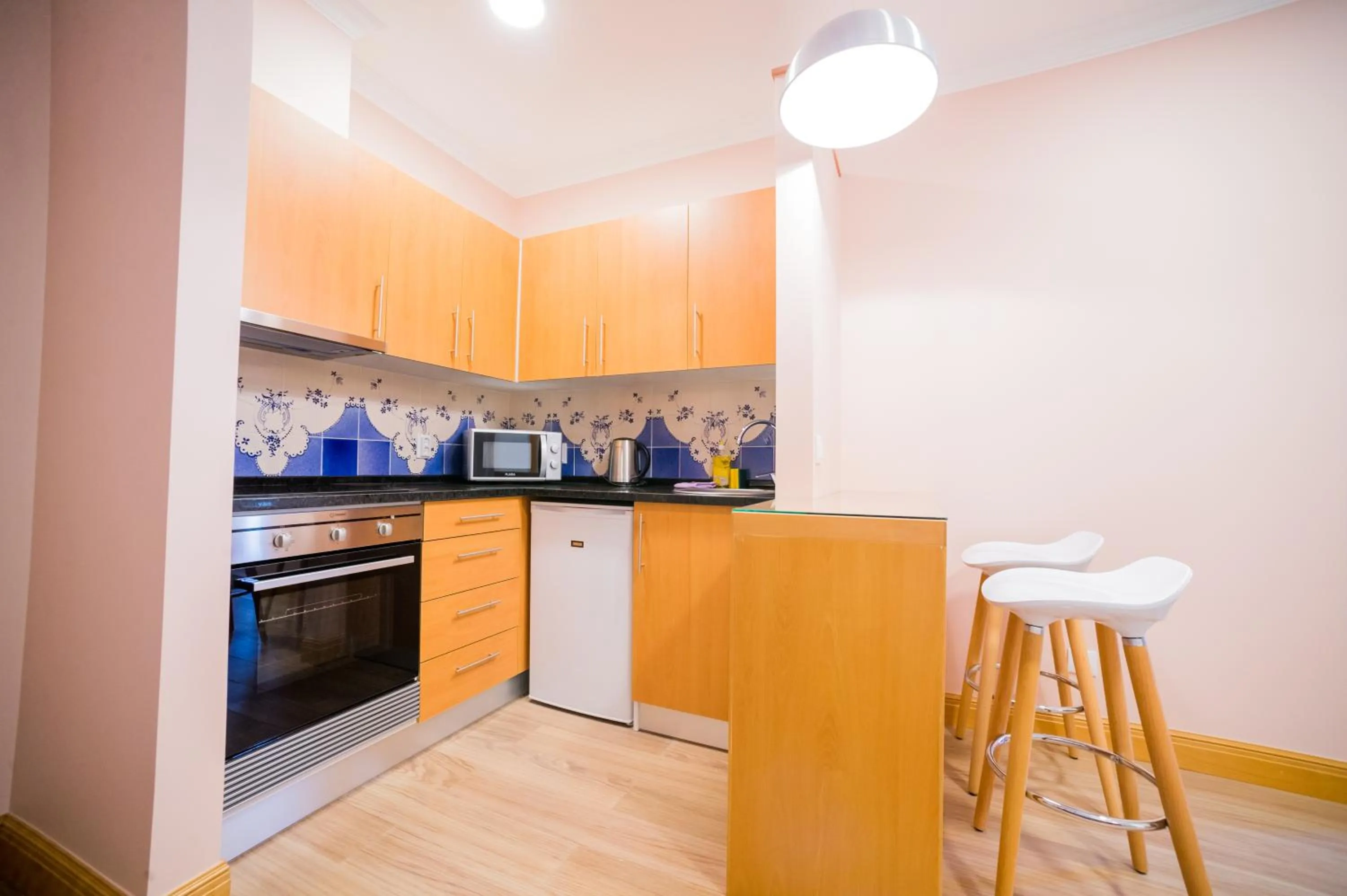 Kitchen or kitchenette in Apartments Madeira City Center