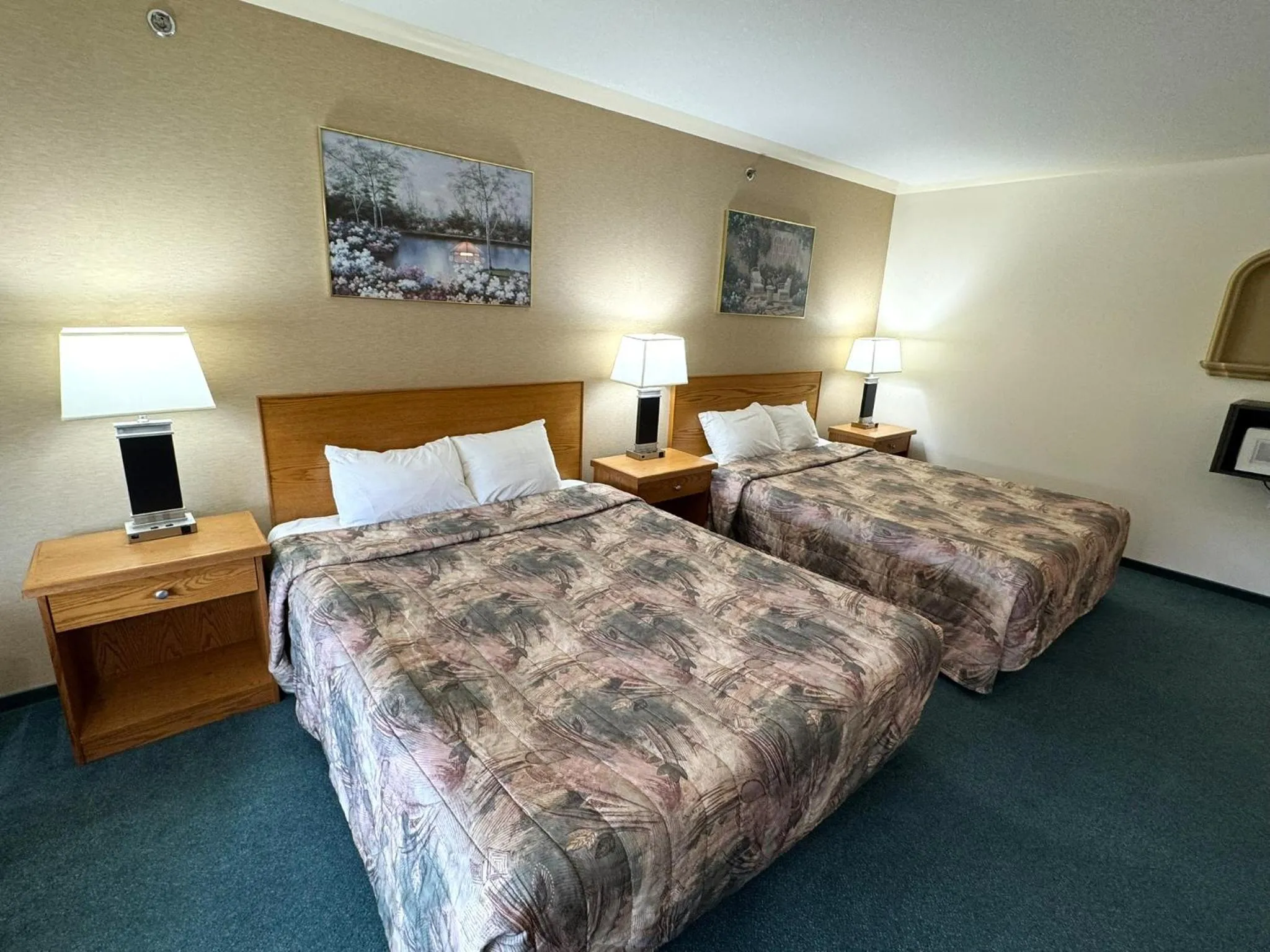 Bed in Western Budget Motel #1 & 2 Whitecourt