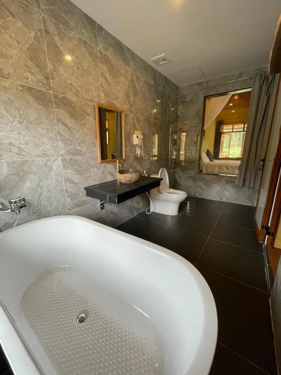 Toilet in Wings Ha Giang Loop Bungalow