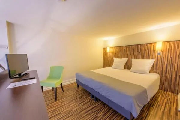 Bed in Appart Hôtel Lyon Villemanzy