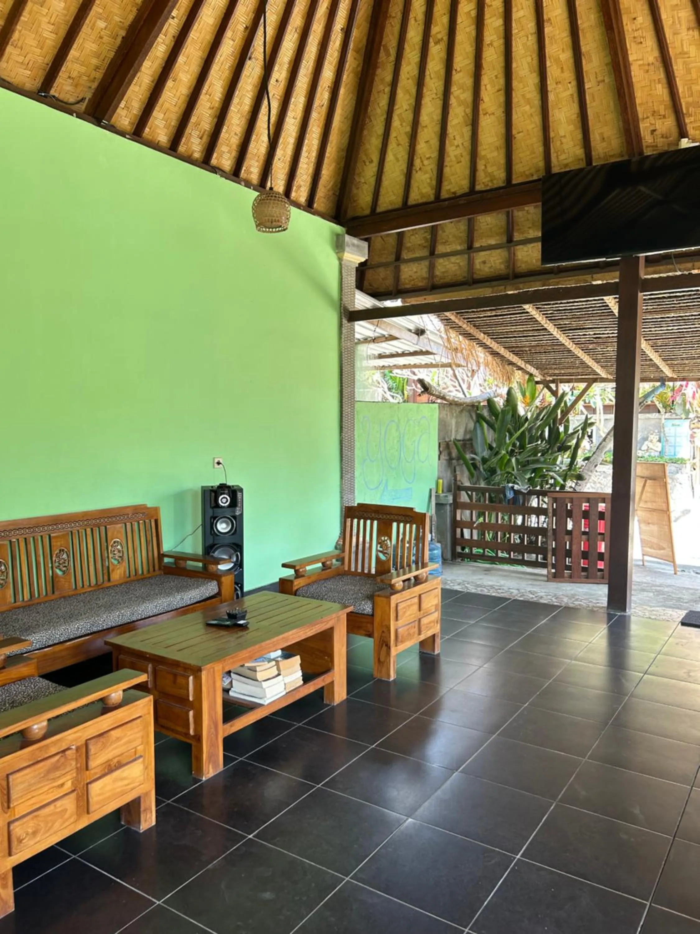 Communal lounge/ TV room in Island Garden Huts Lembongan