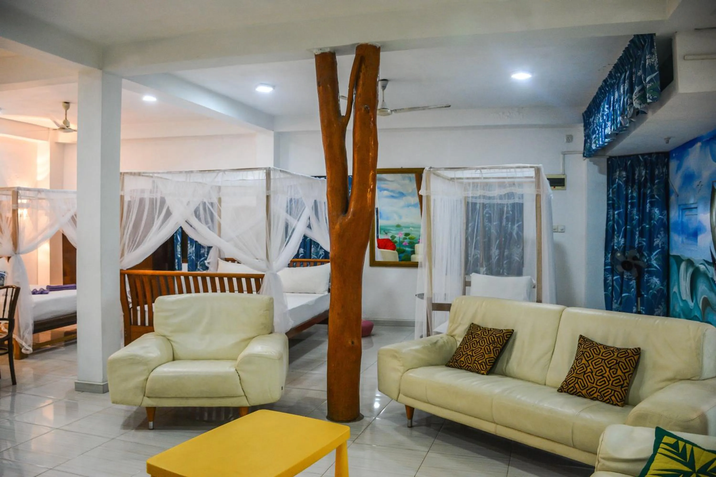 Bed in Blue Horizon Beach Hotel