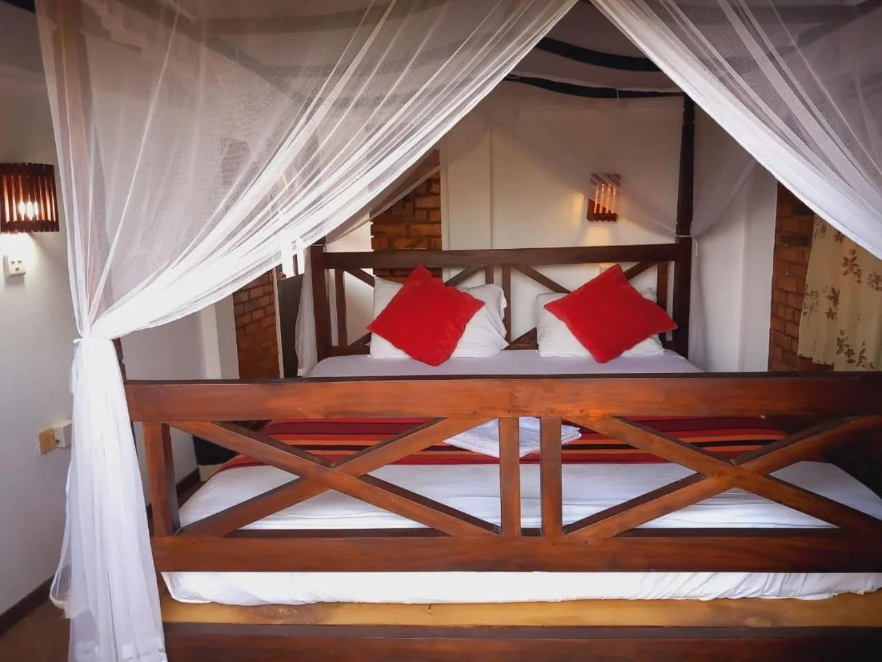 Bed in Blue Horizon Beach Hotel