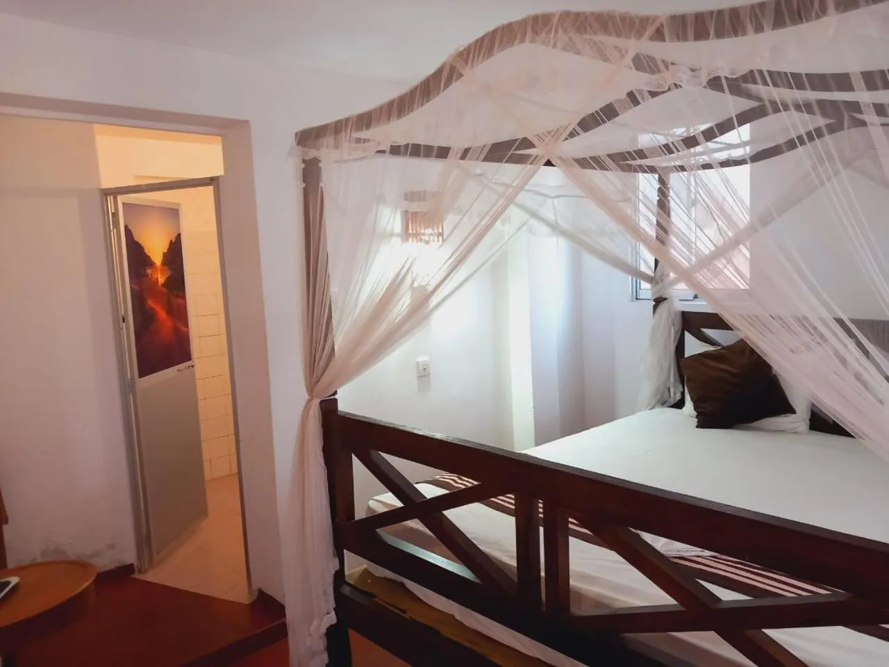 Bed in Blue Horizon Beach Hotel