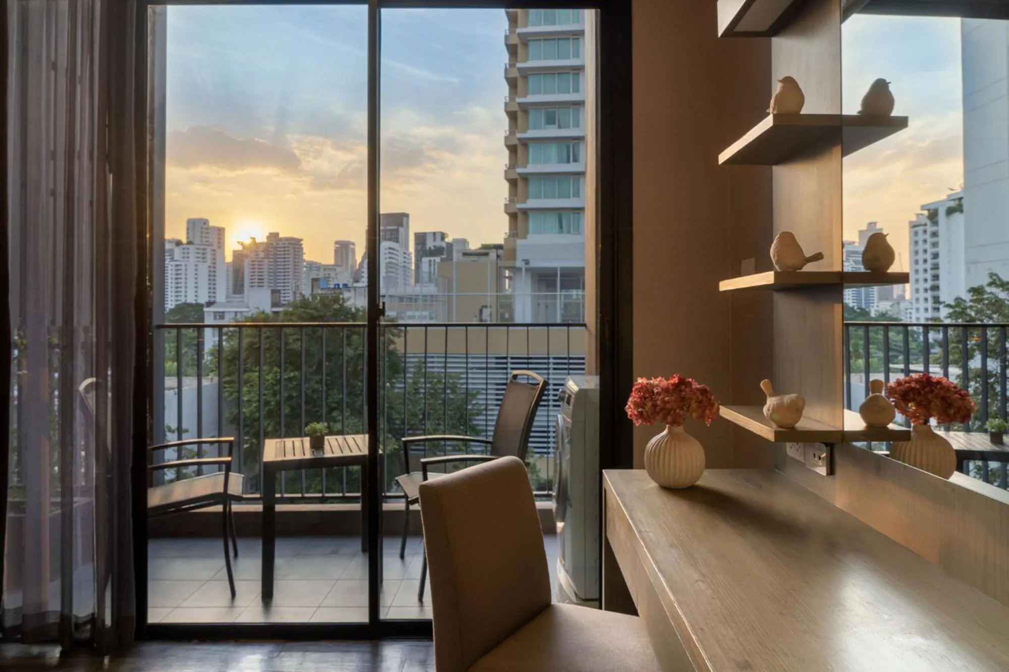Living room in Metropolis Suites Bangkok, Tapestry Collection by Hilton