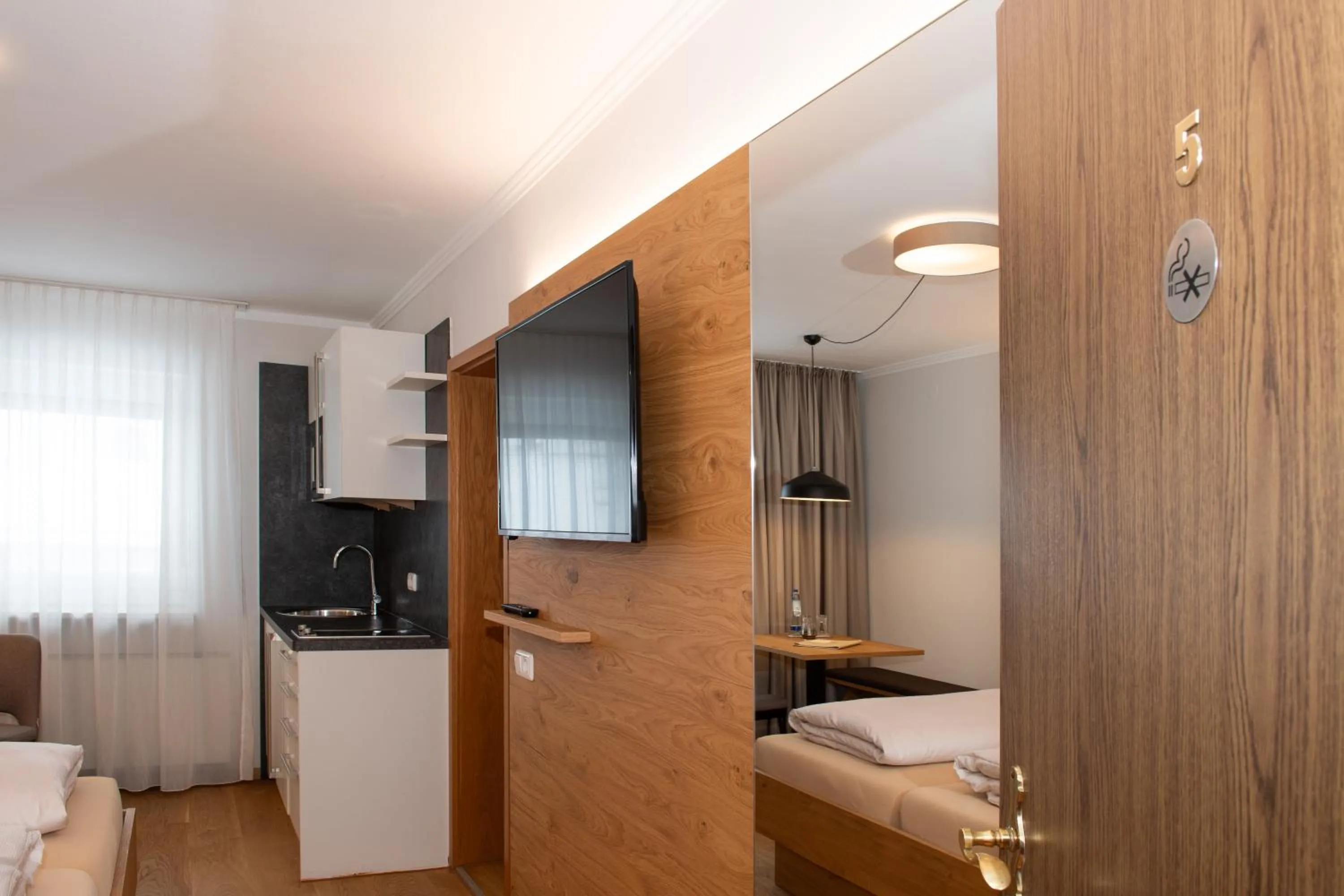 kitchen, Bed in Hotel Bockmaier