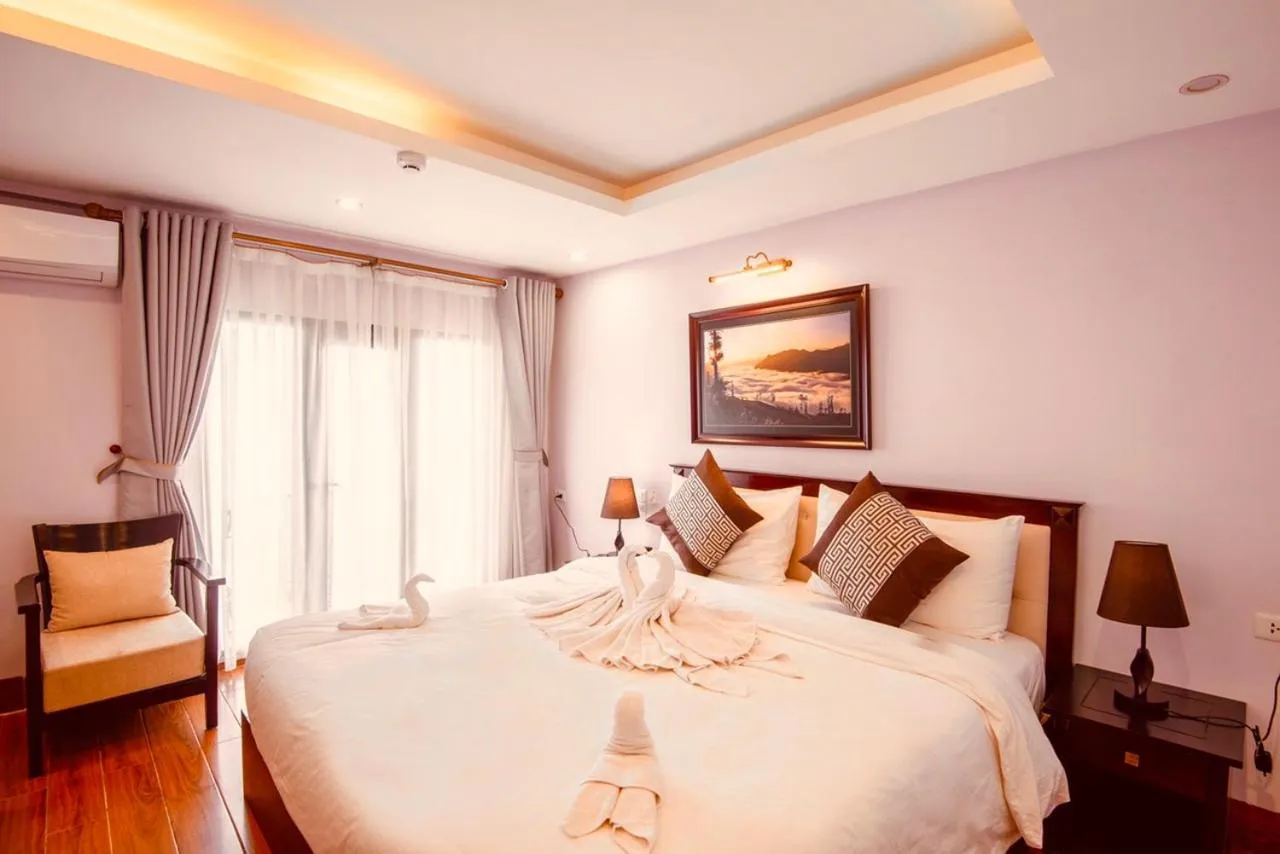 Bed in Le Bordeaux Sapa Hotel
