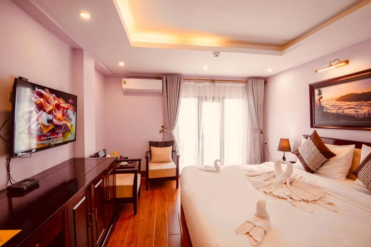 Bed in Le Bordeaux Sapa Hotel